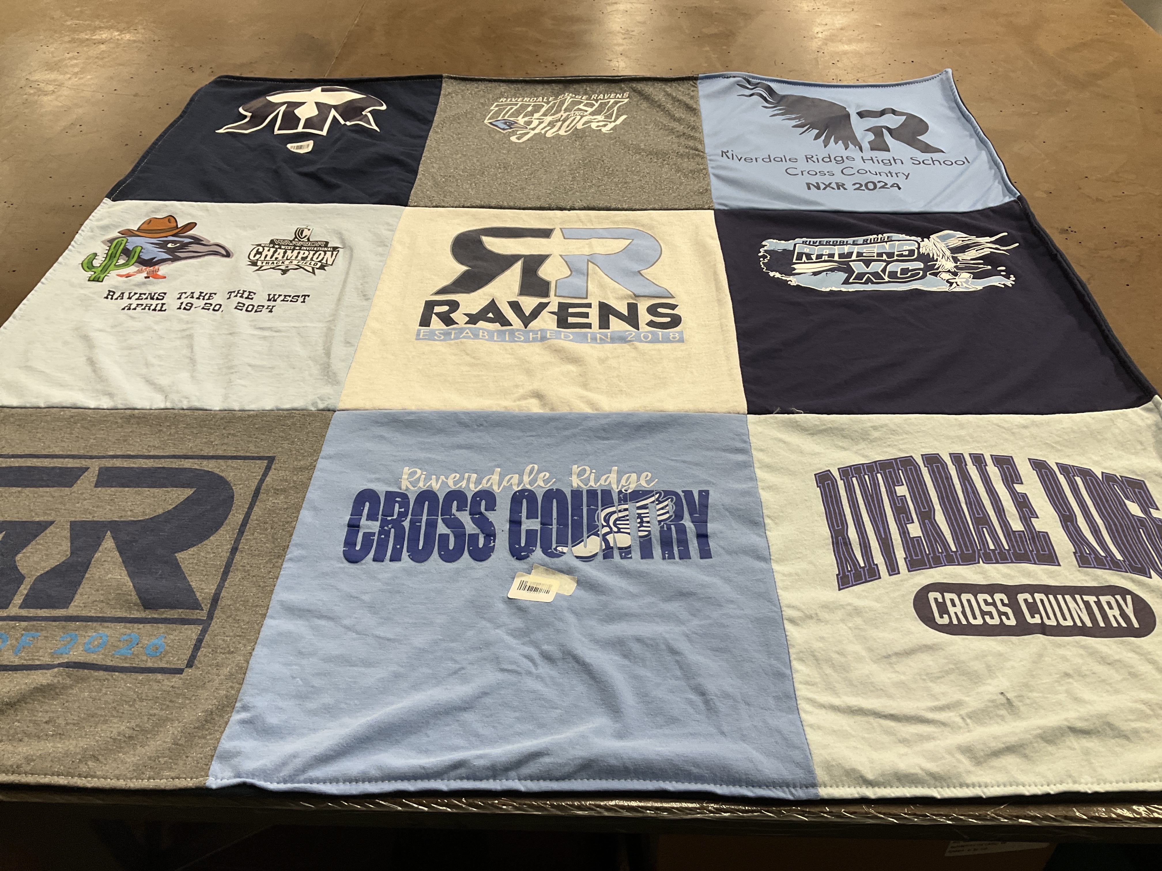 T-shirt quilt featuring riverdale ridge cross country team by Kendra from CO