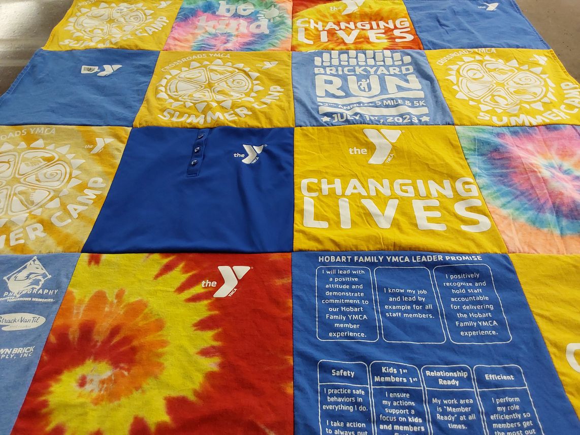 T-shirt quilt with community service, youth programs themes by Beth from IN