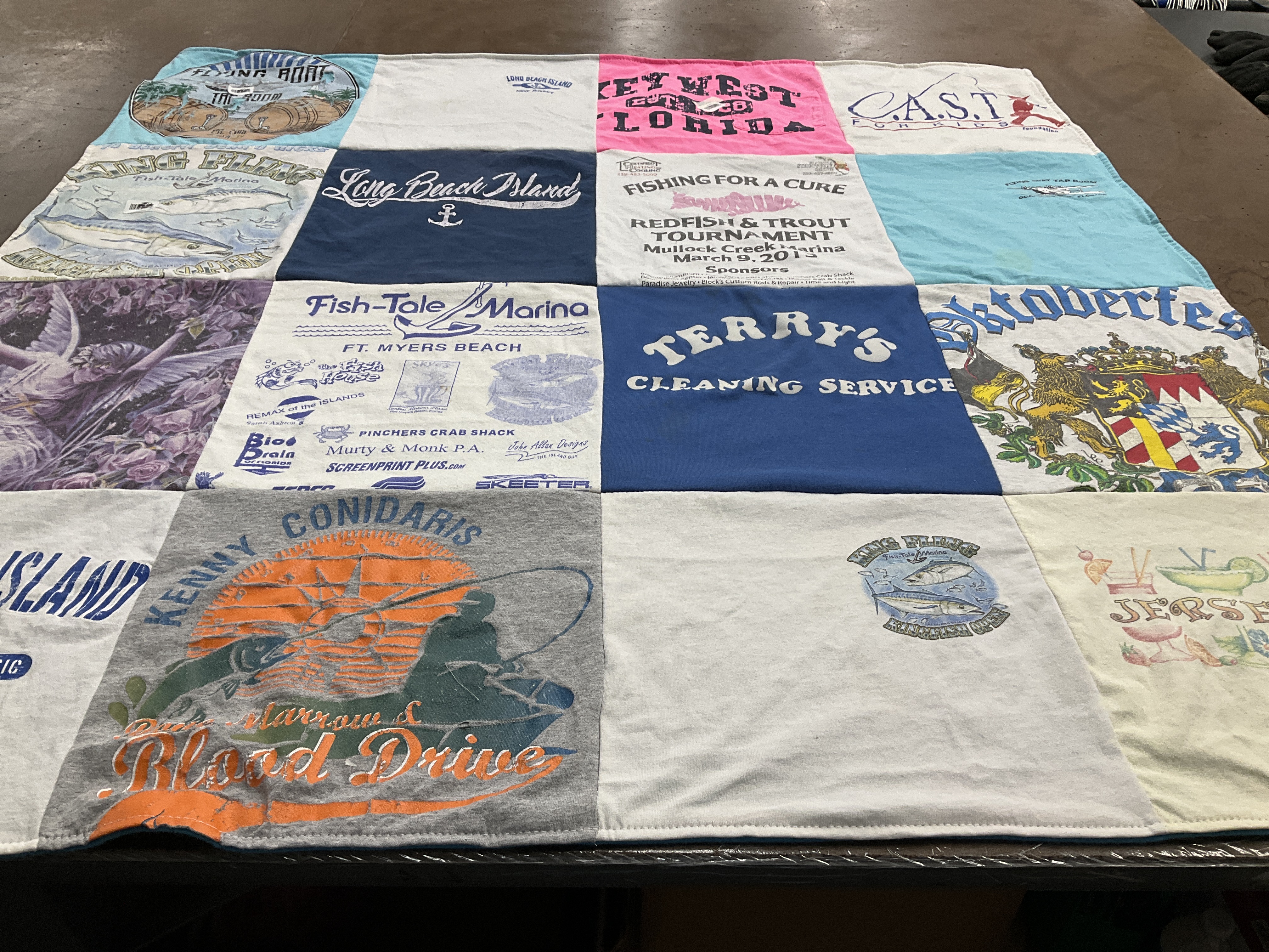 T-shirt quilt with fishing, maritime activities themes by Tina from NJ
