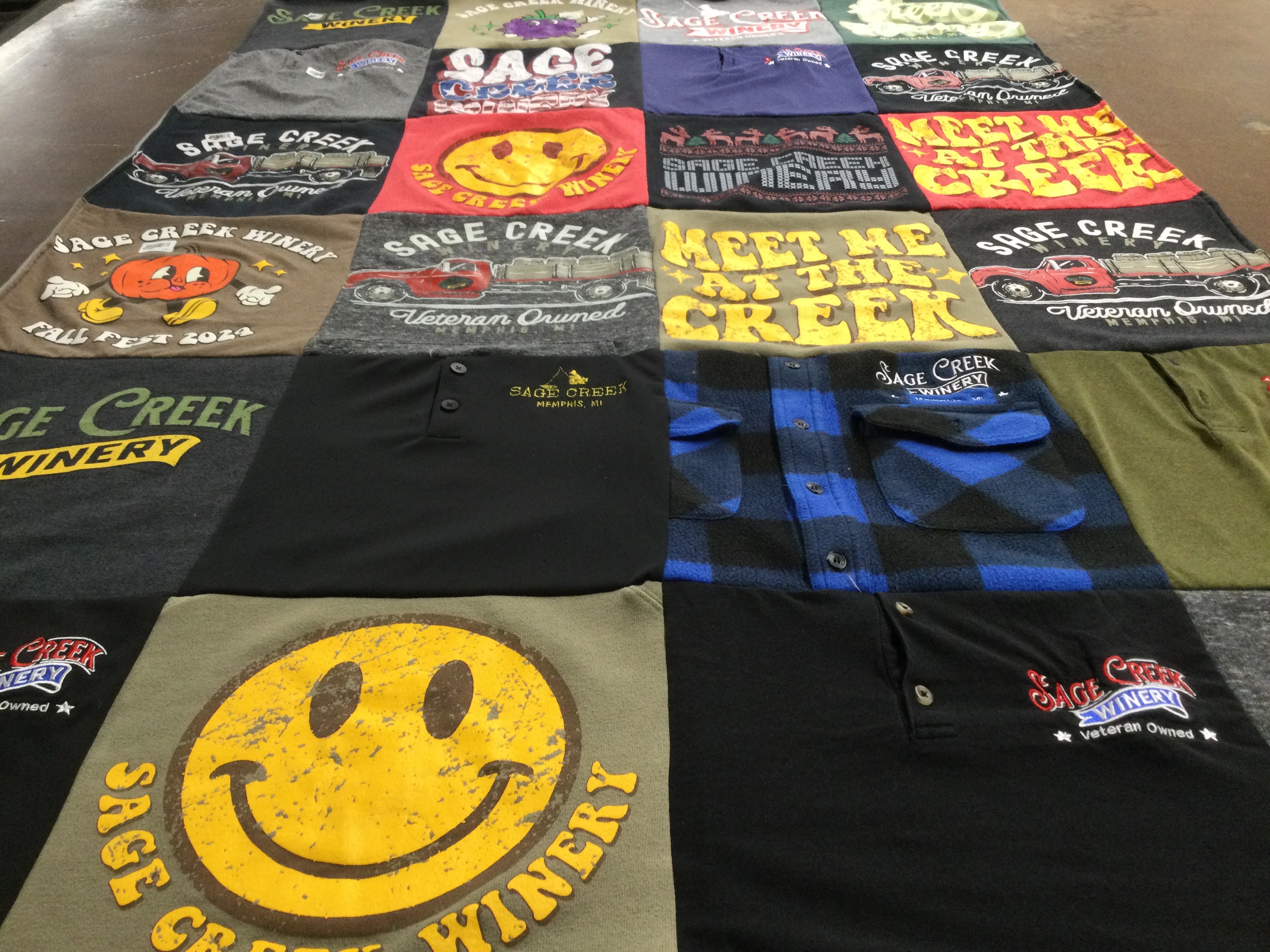 T-shirt quilt with winery, veterans themes by Richele from MI