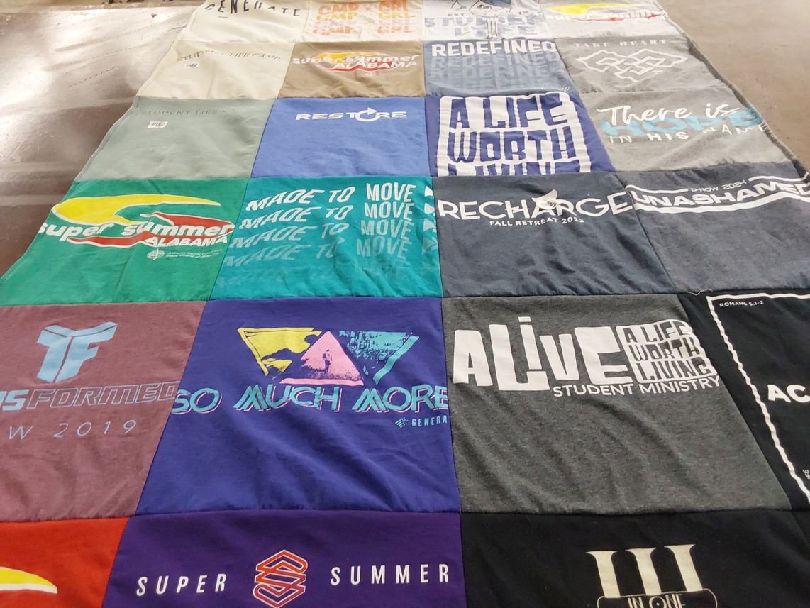 T-shirt quilt with youth programs, retreats themes by Tara from LA