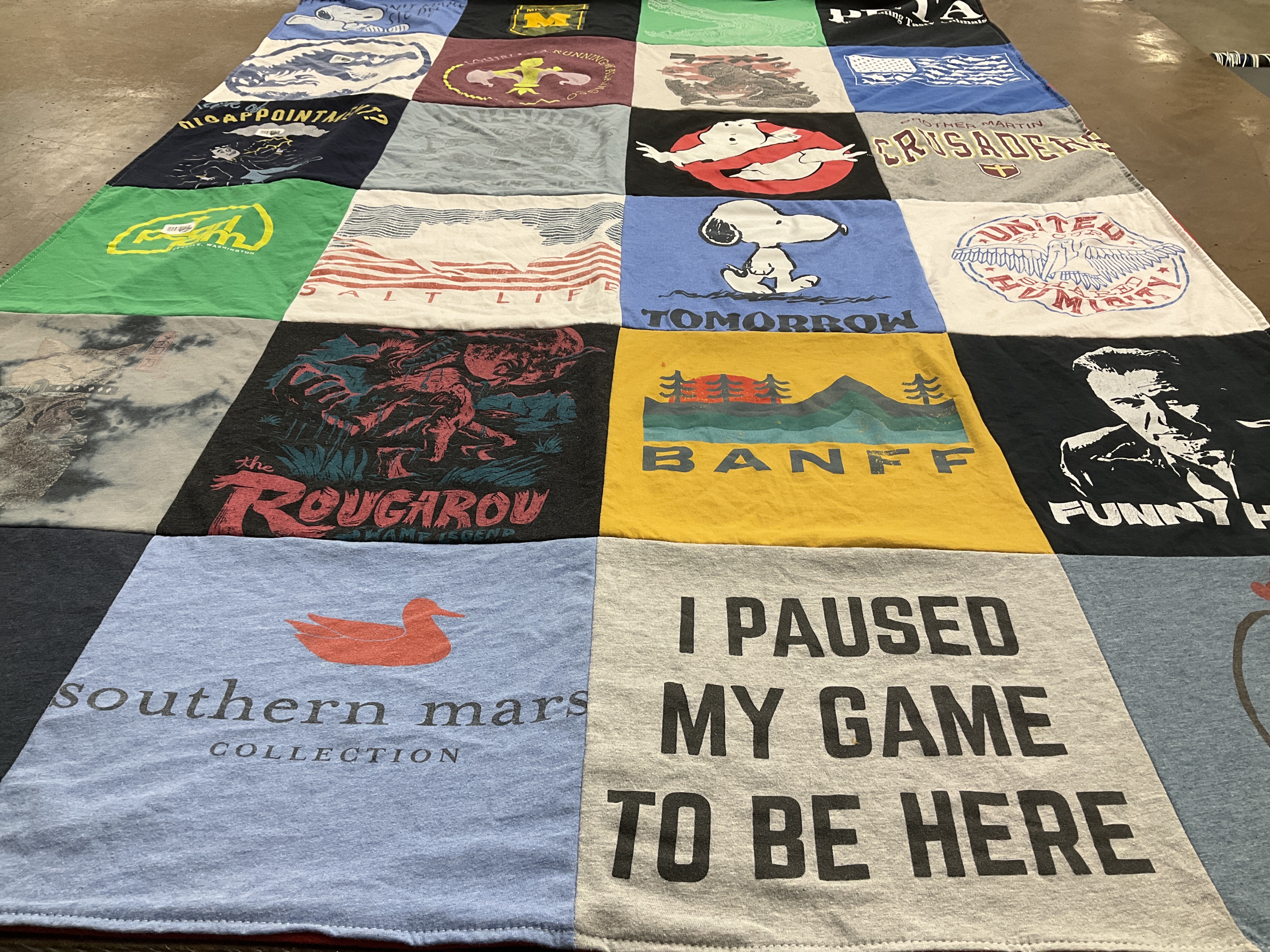 T-shirt quilt with gaming, outdoors themes by elise from LA
