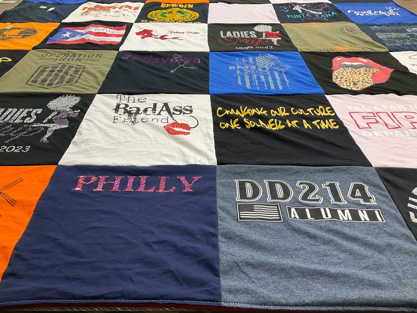 T-shirt quilt with community, culture themes by Phyllis from VA
