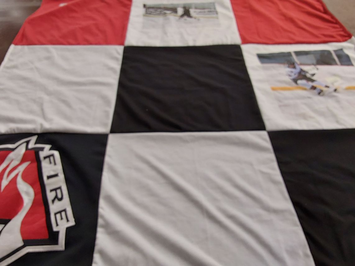 T-shirt quilt with hockey themes by Katia from FL