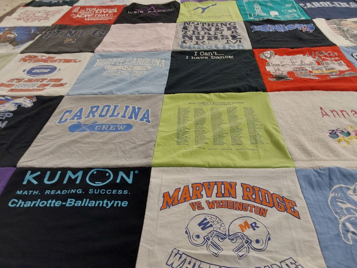 T-shirt quilt featuring marvin ridge high school, weddington high school by Carol Ann from NC
