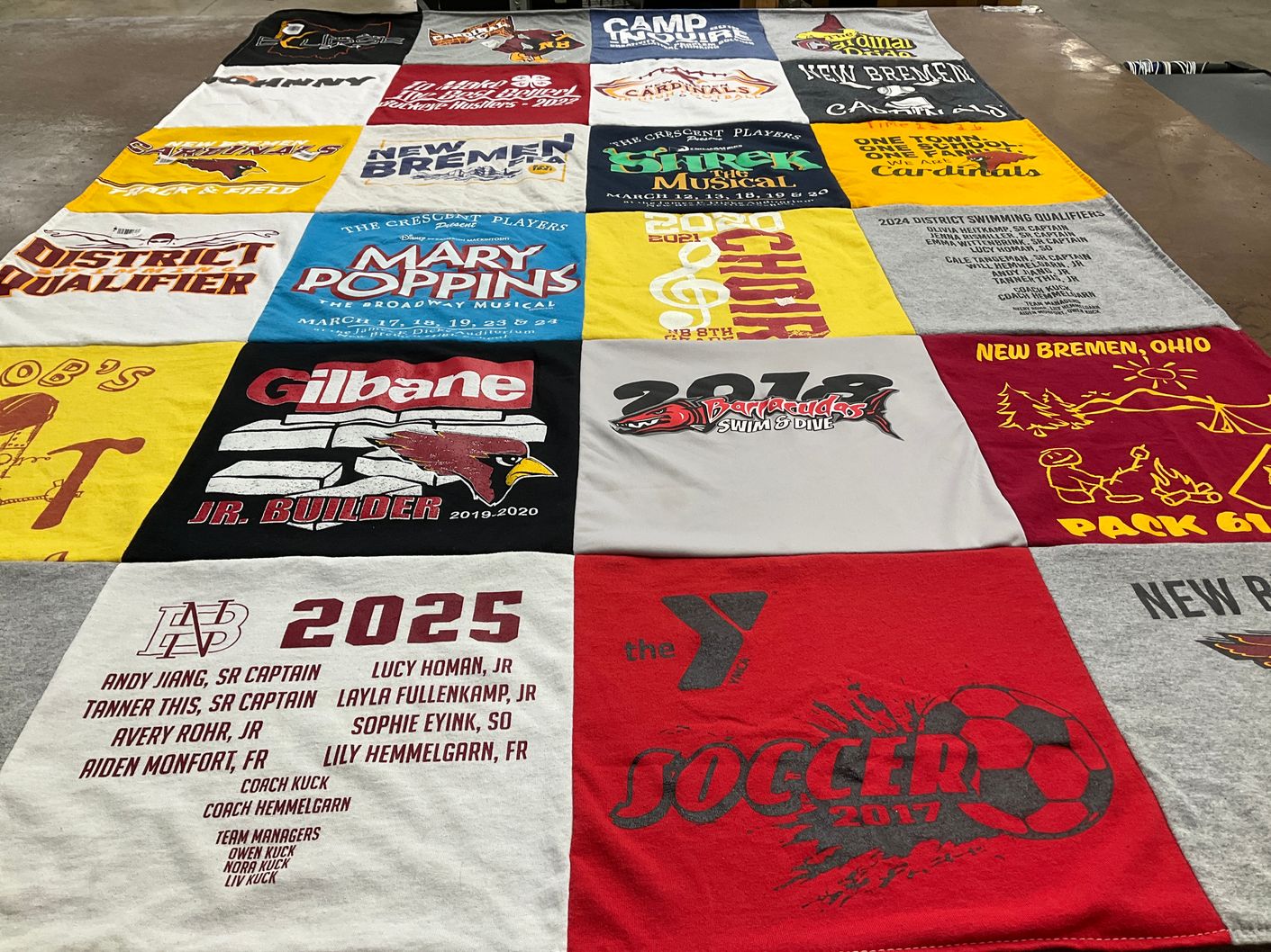 T-shirt quilt featuring new bremen soccer team, barracudas swim and dive team by Lori from OH