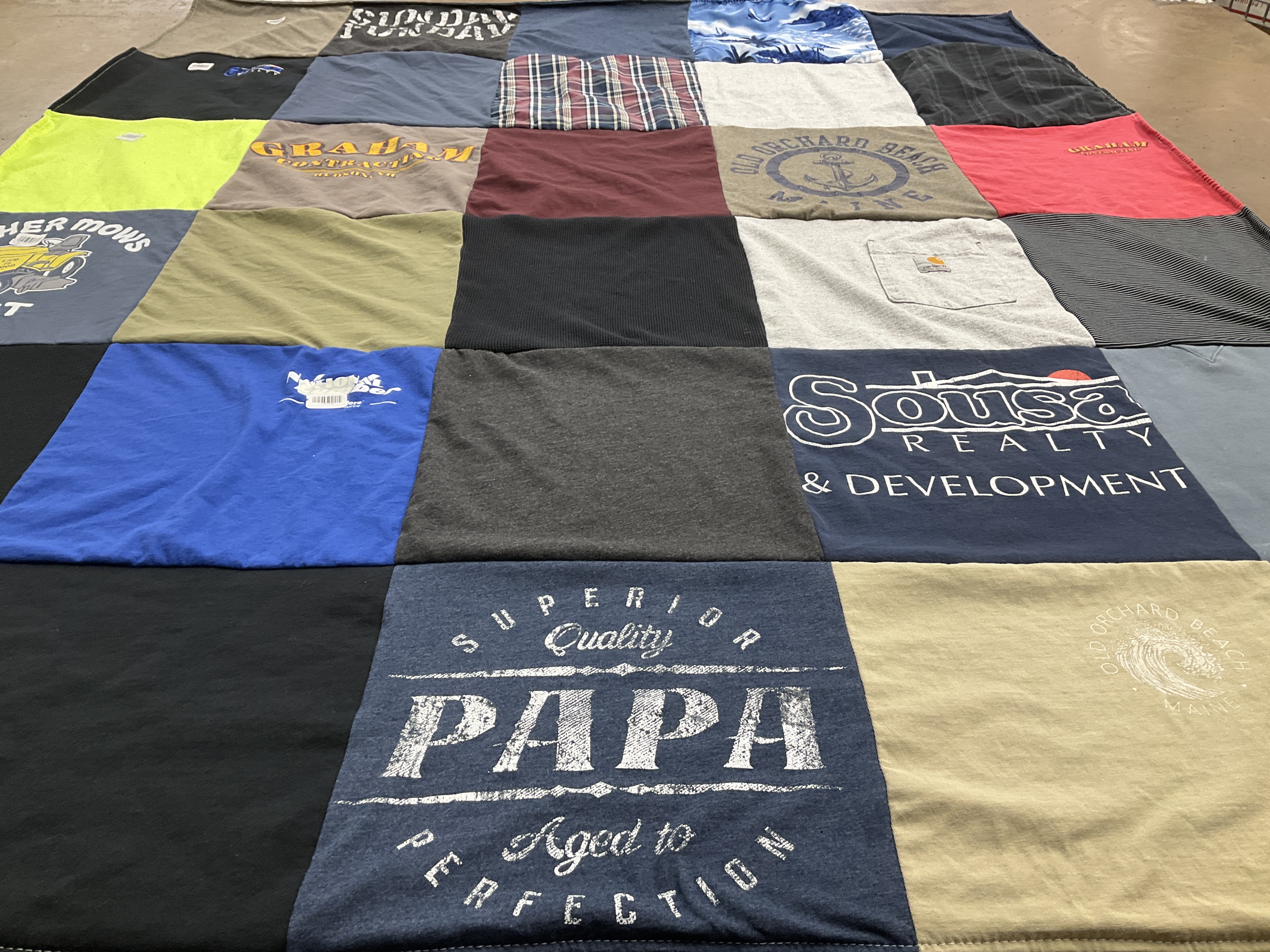 T-shirt quilt with real estate, beach activities themes by Allyson from NH