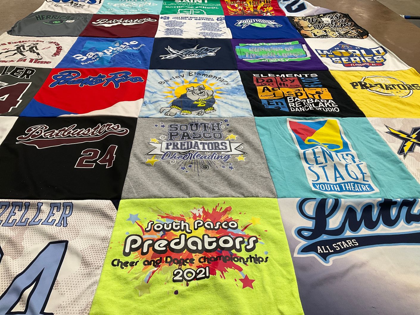T-shirt quilt with sports, theater themes by Shelley from FL