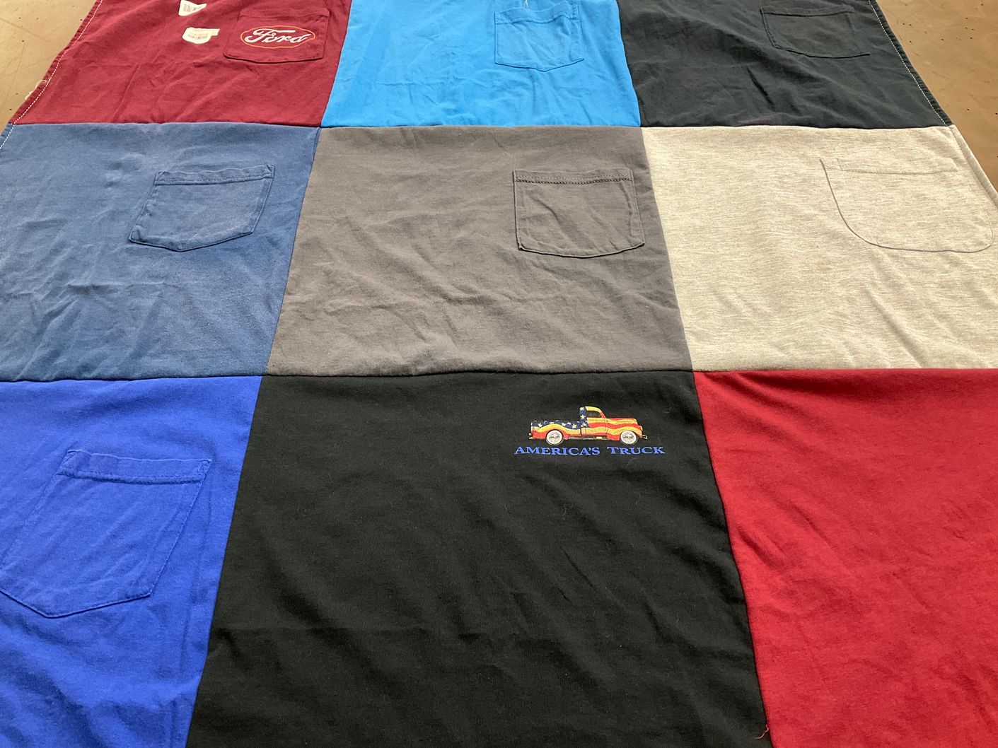 T-shirt quilt with cars, trucks themes by linda from WV
