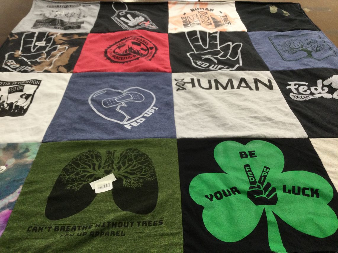 T-shirt quilt with environmental activism, health awareness themes by Faith from OH