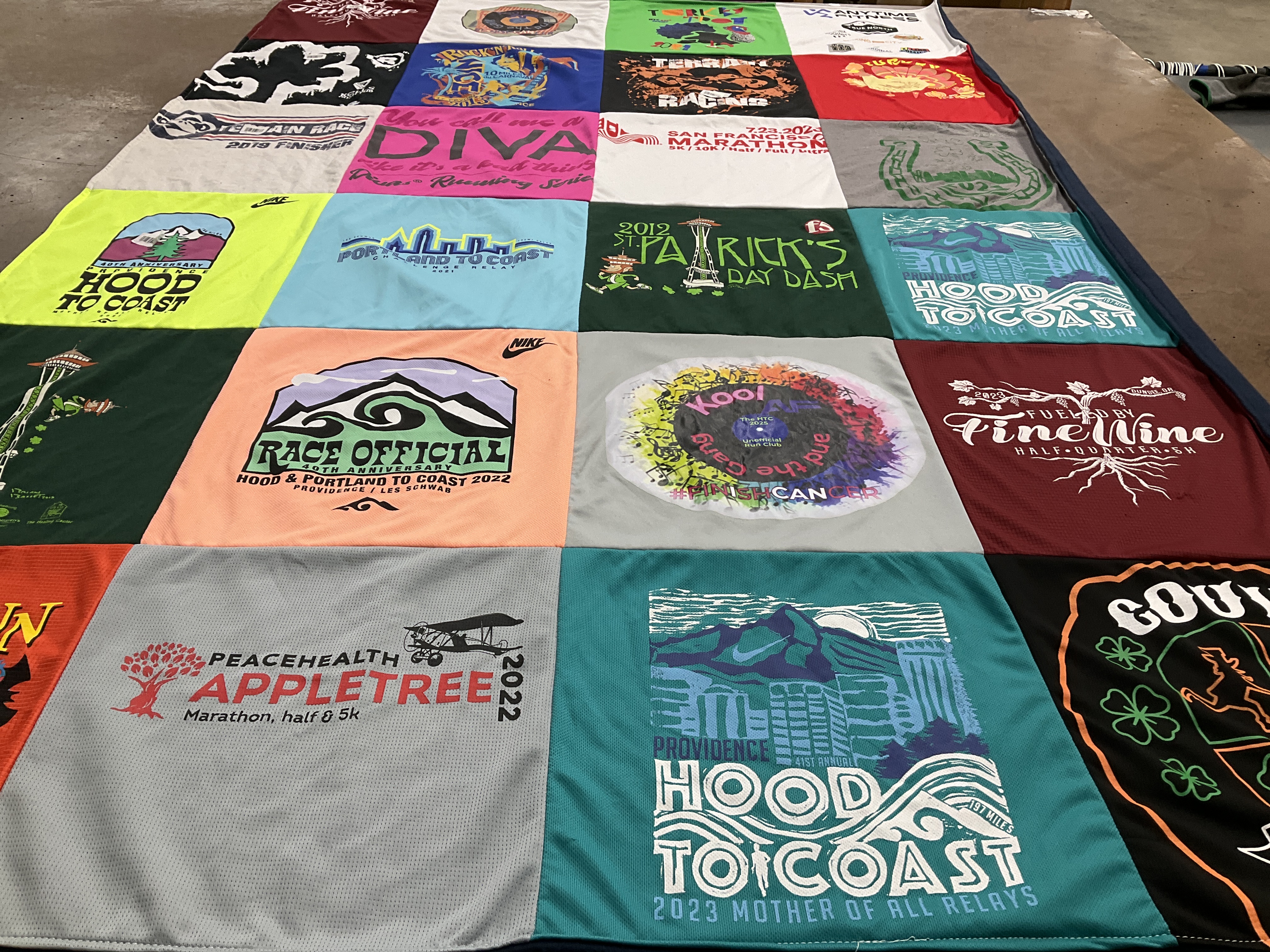 T-shirt quilt with marathons, running themes by christine from WA