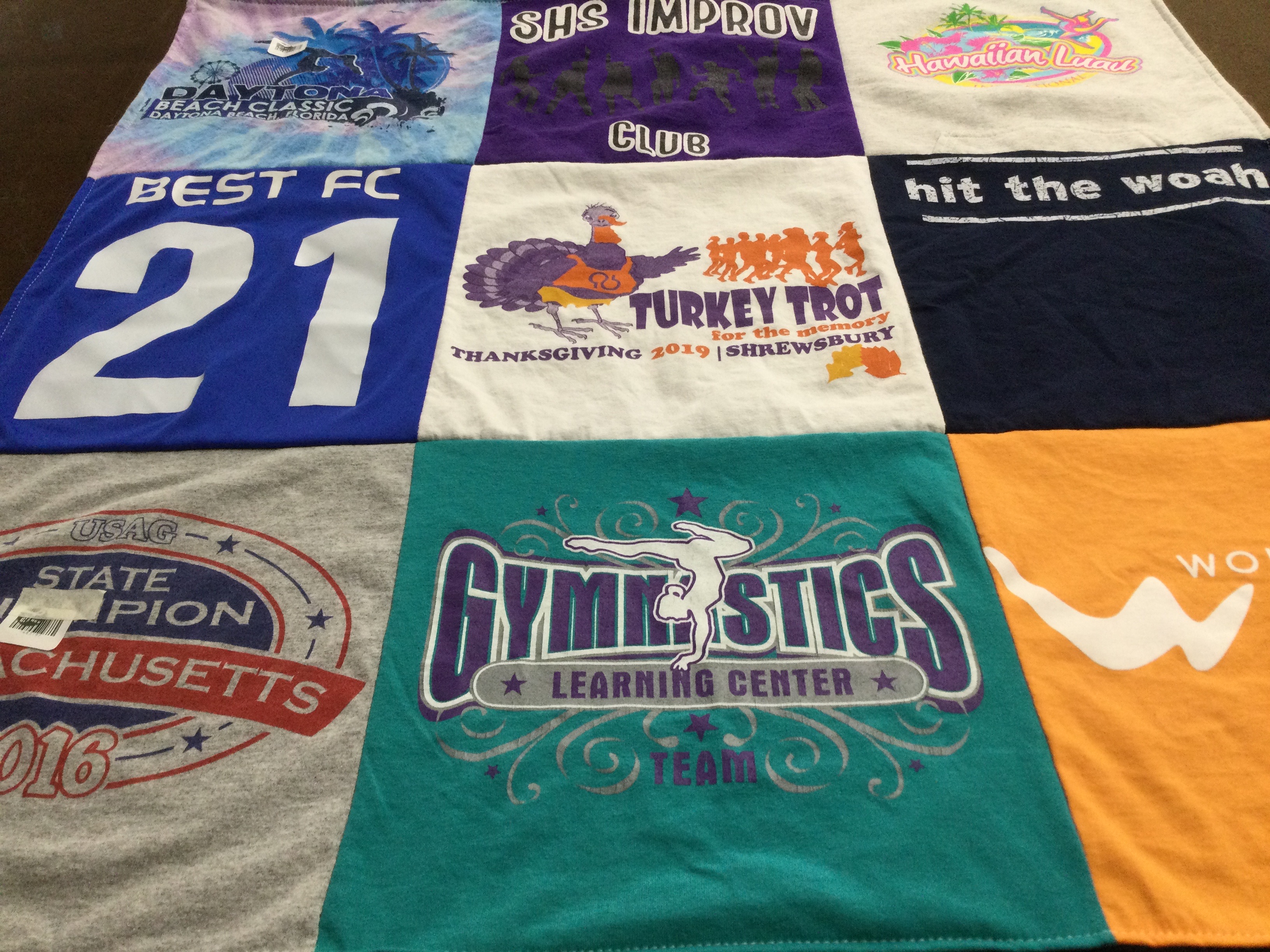 T-shirt quilt featuring gymnastics learning center team by stacey from MA