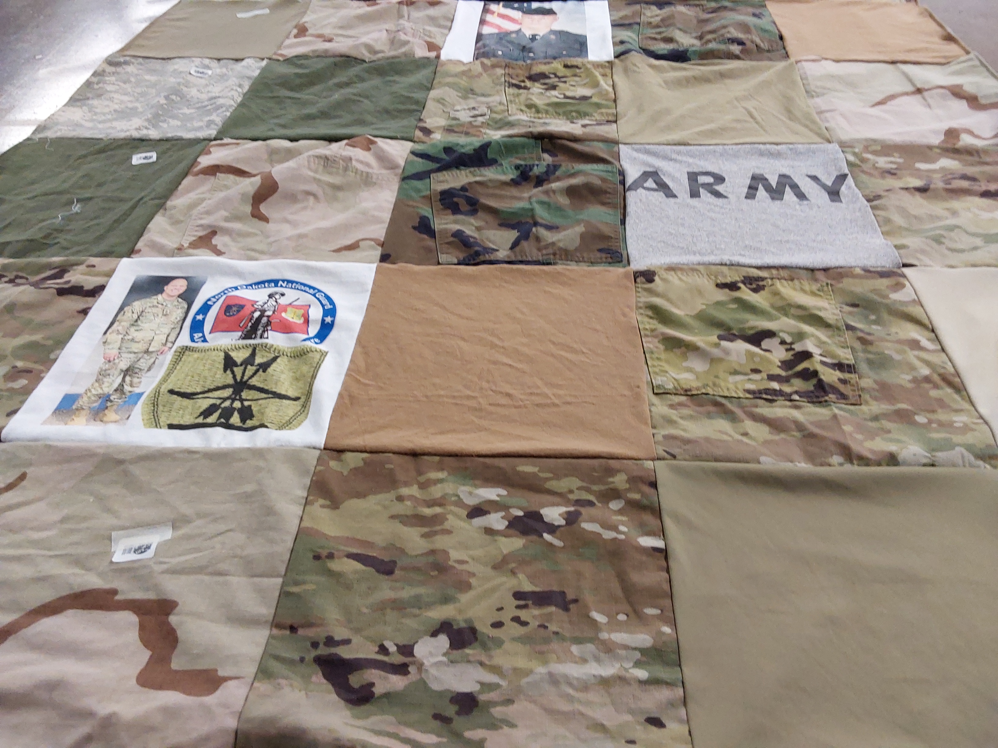 T-shirt quilt with military, service themes by Jamie from ND