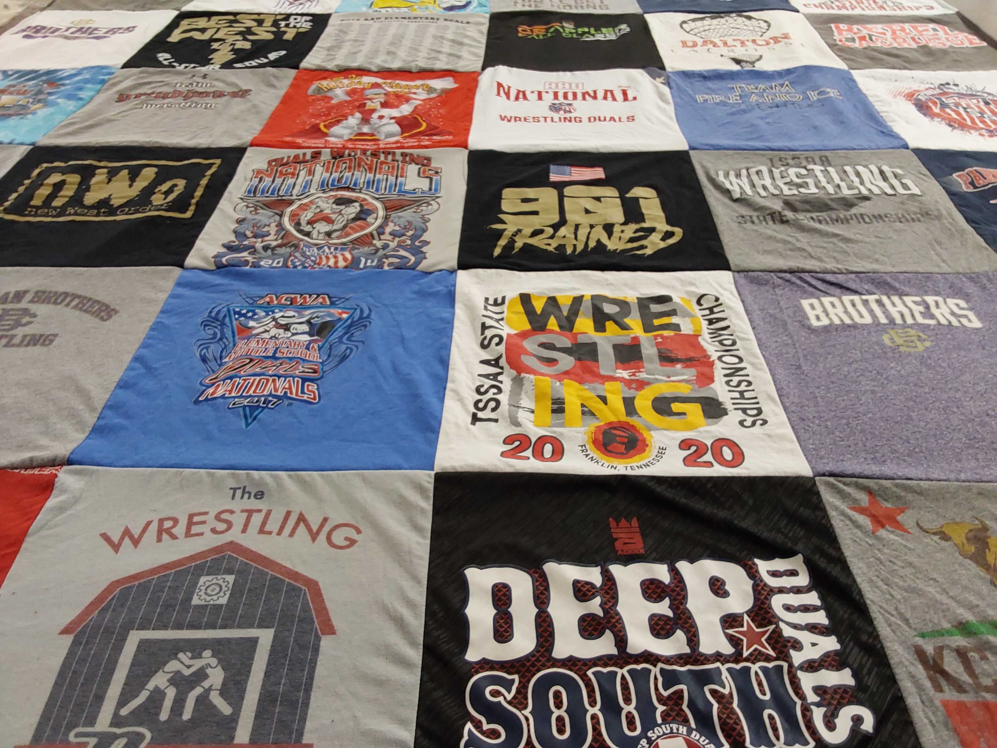 T-shirt quilt with wrestling themes by Jon from MS