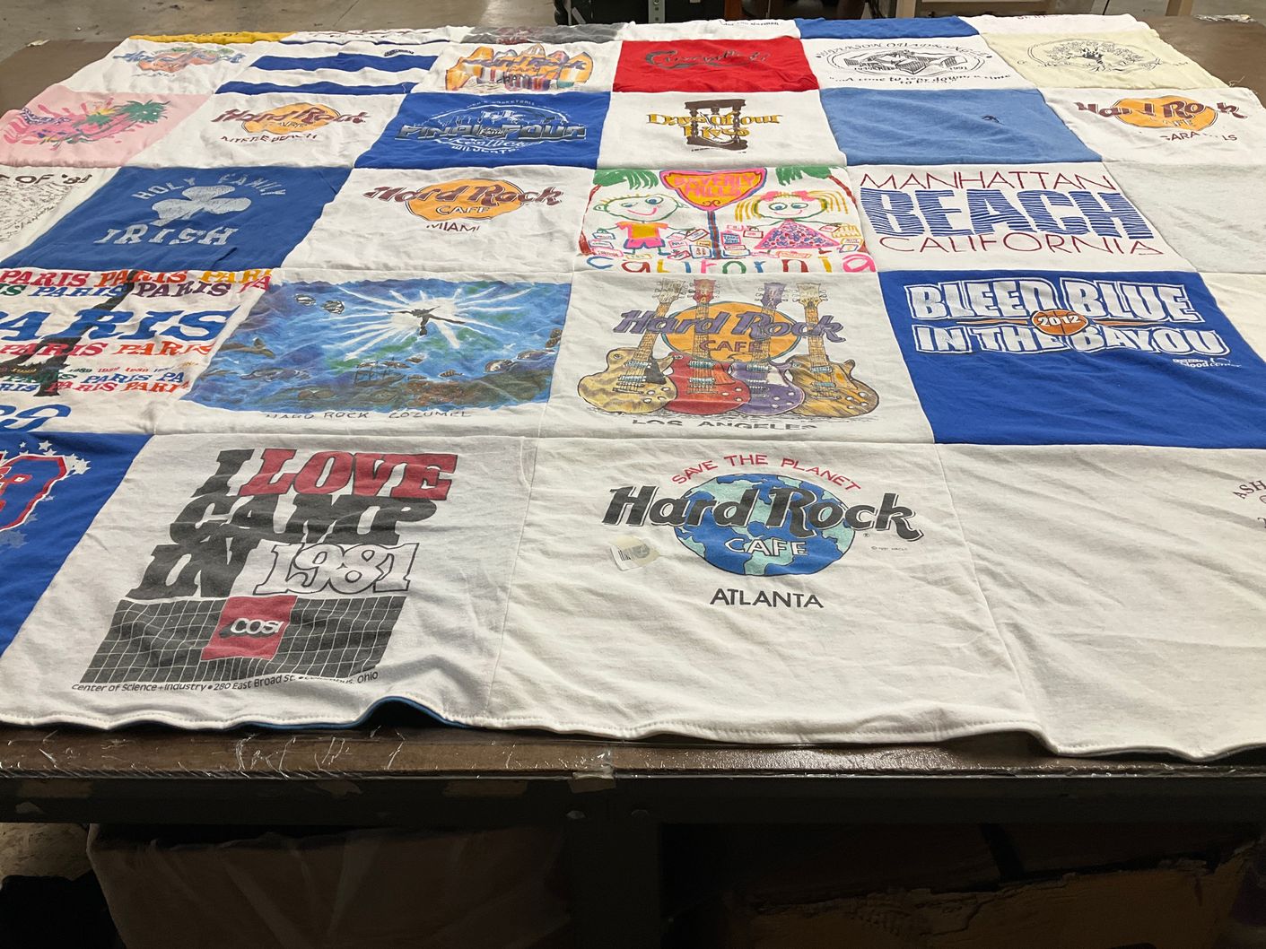 T-shirt quilt with travel, music themes by Patricia from VA