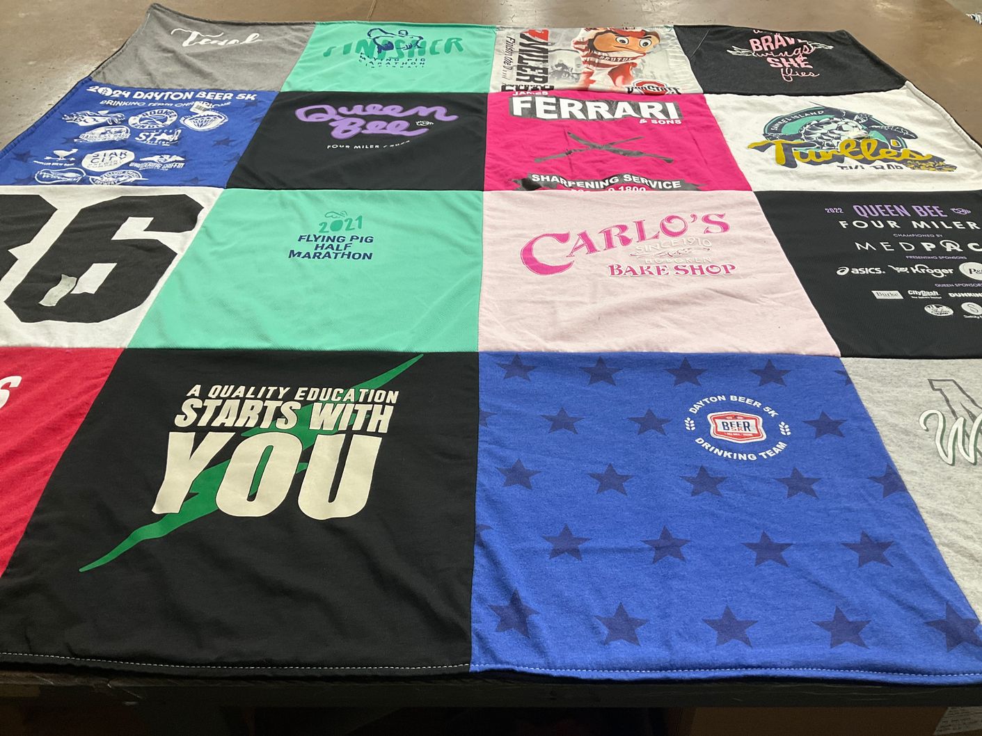 T-shirt quilt featuring dayton beer drinking team by Tina from OH