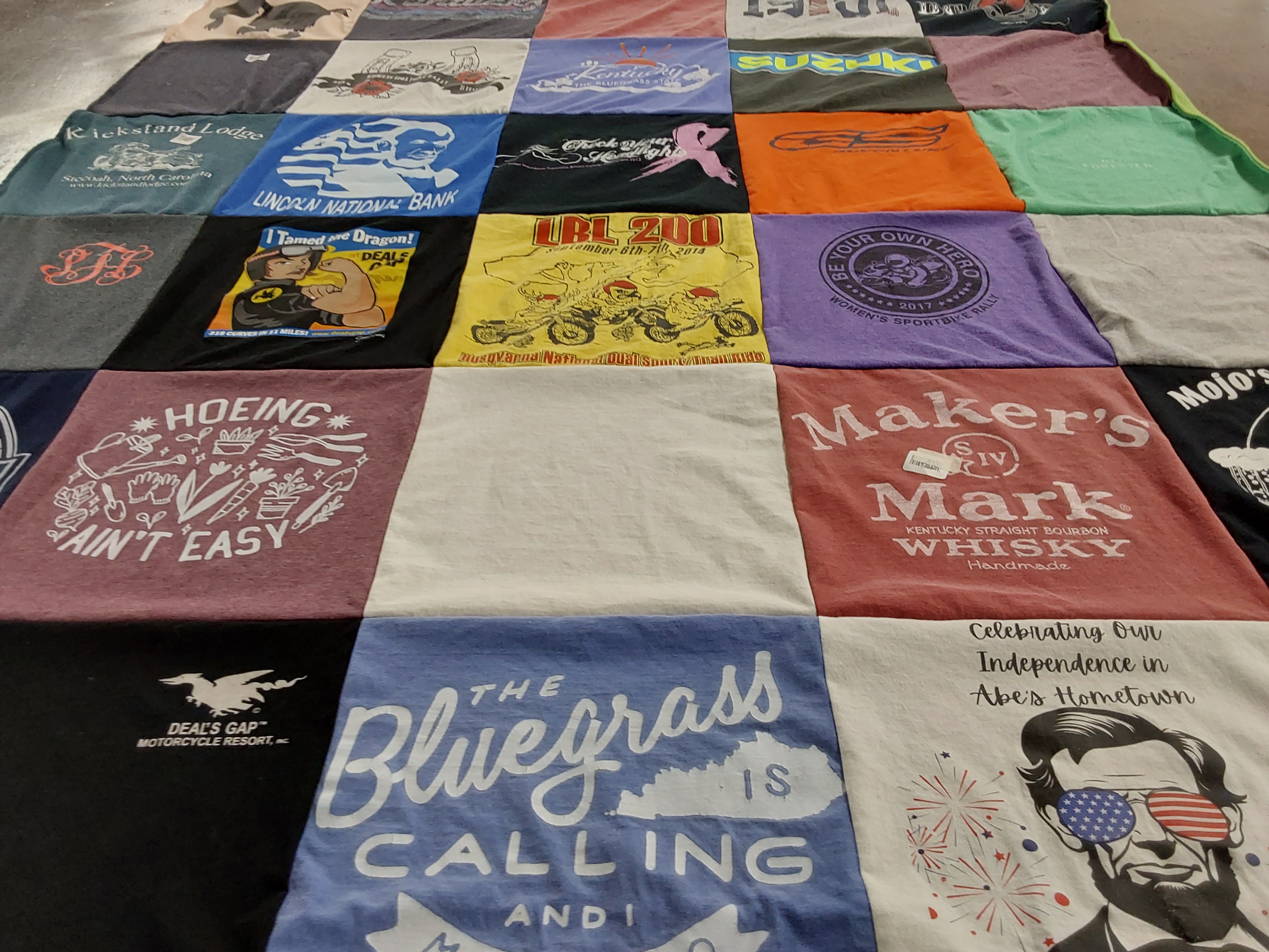 T-shirt quilt with motorcycles, whiskey themes by Peggy from KY