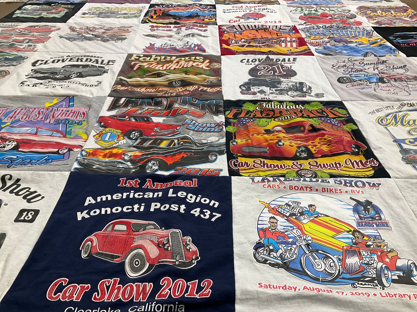 T-shirt quilt with cars, boating themes by Joe from CA