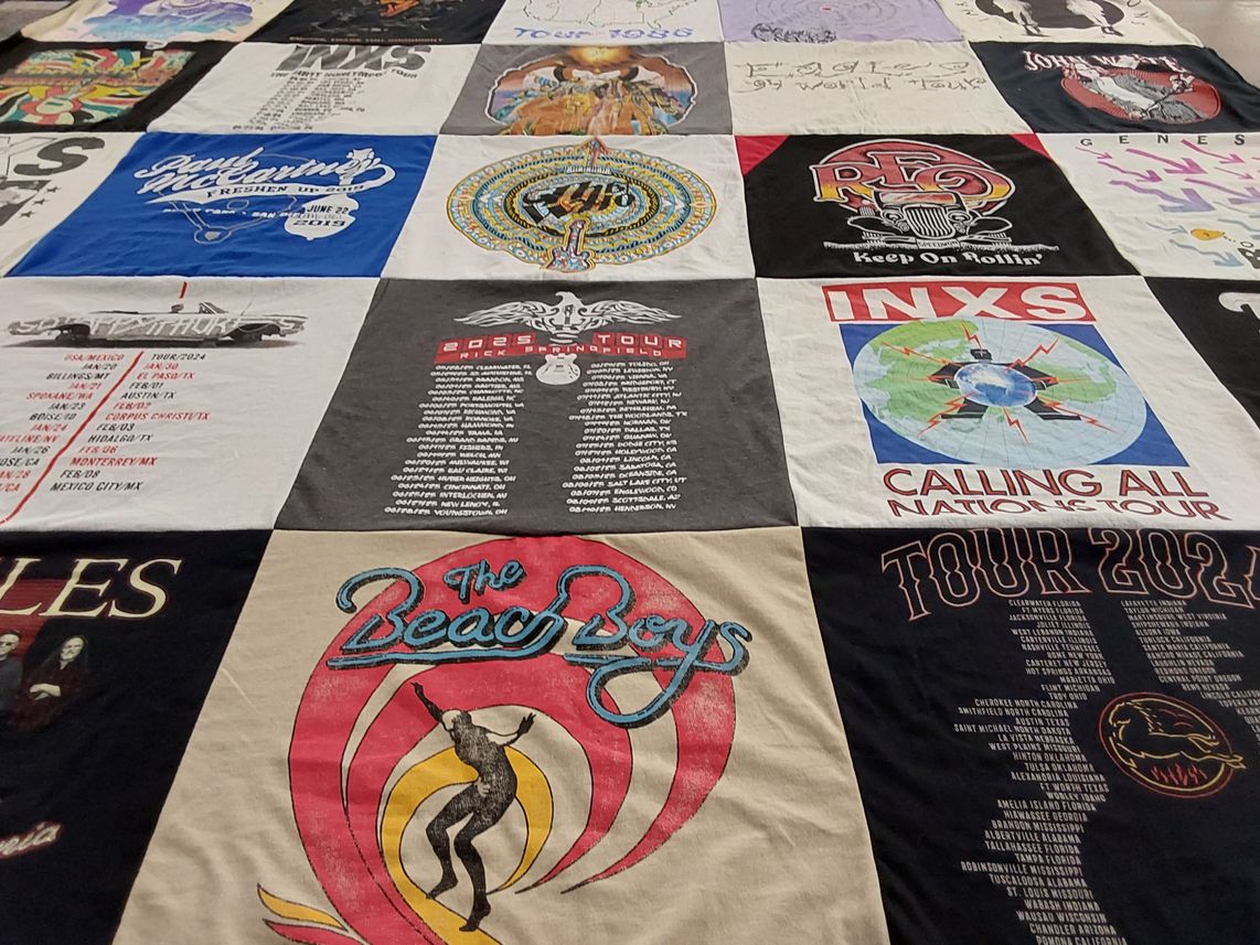 T-shirt quilt with music, concerts themes by Donna from CA