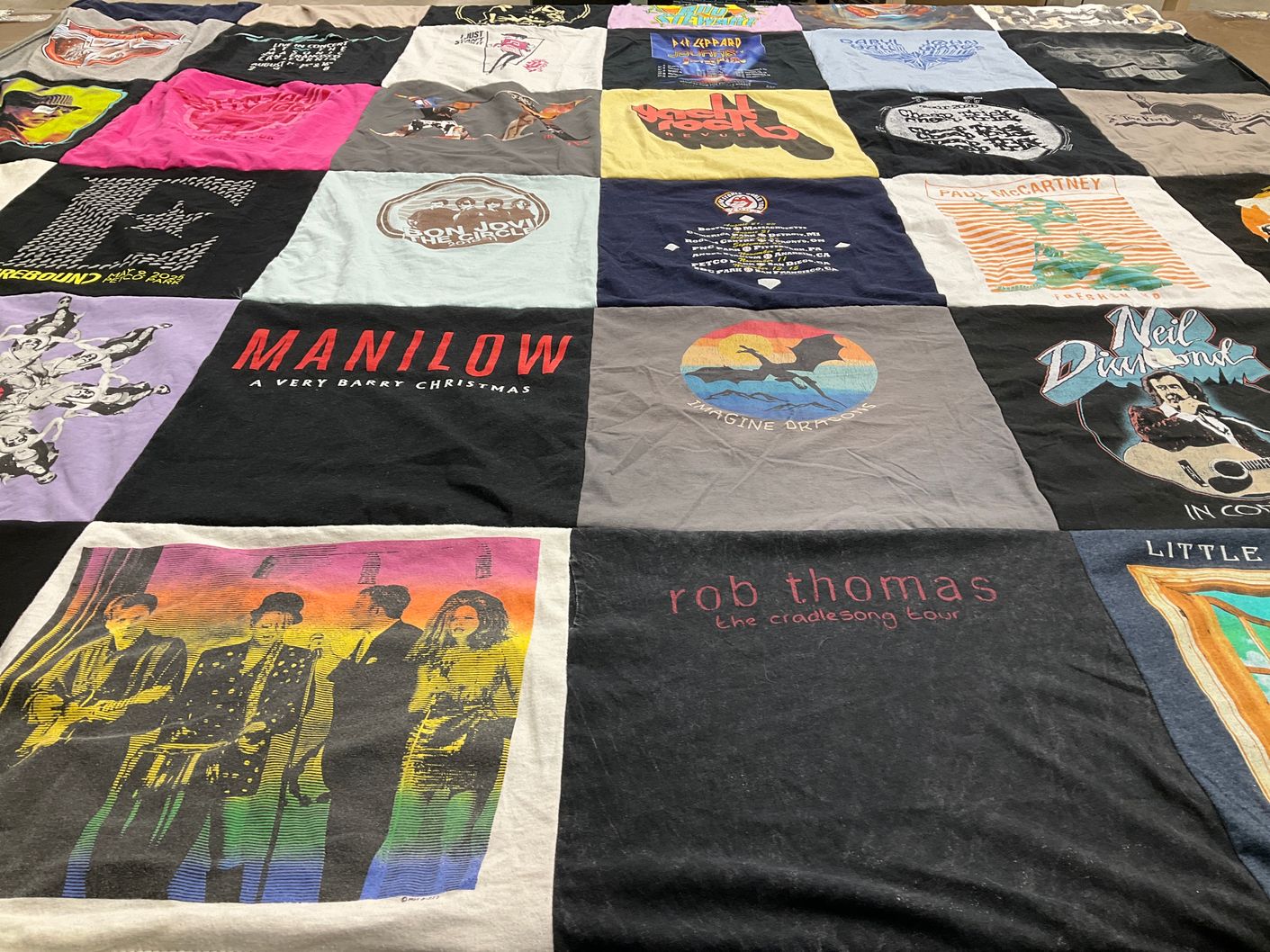 T-shirt quilt with music, concerts themes by Donna from CA