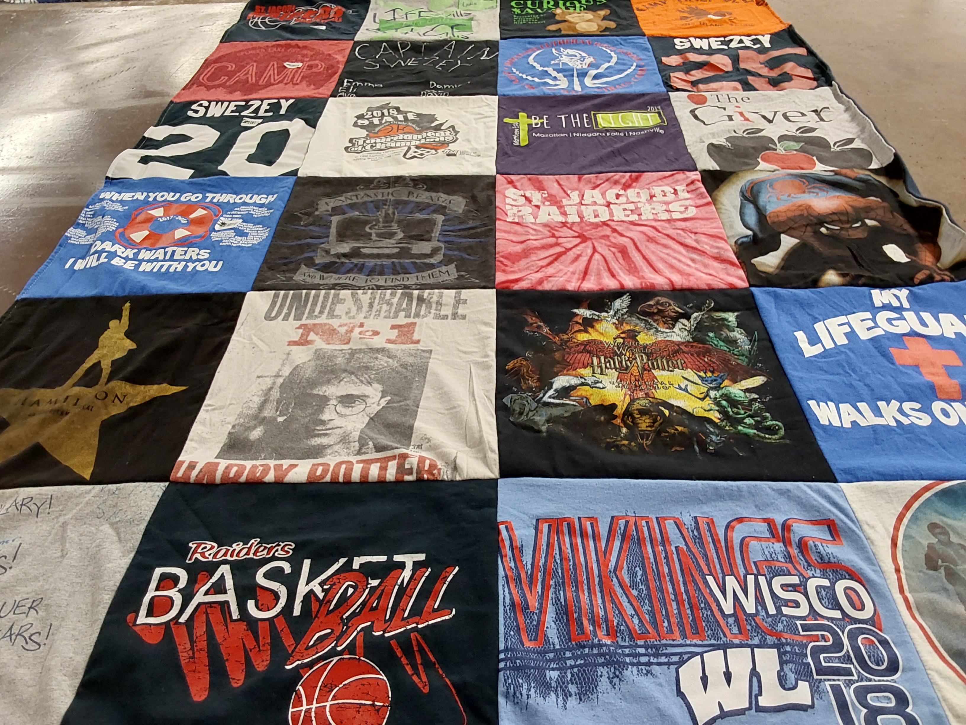 T-shirt quilt featuring raiders basketball, vikings by sharon from WI