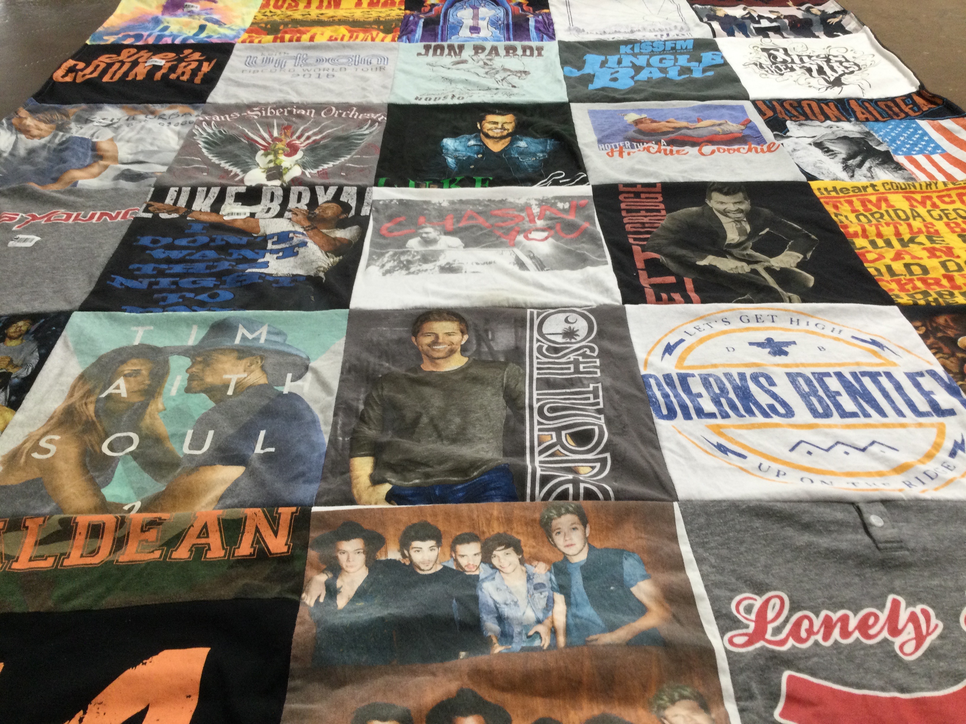 T-shirt quilt with country music, southern culture themes by Kassidy from TX