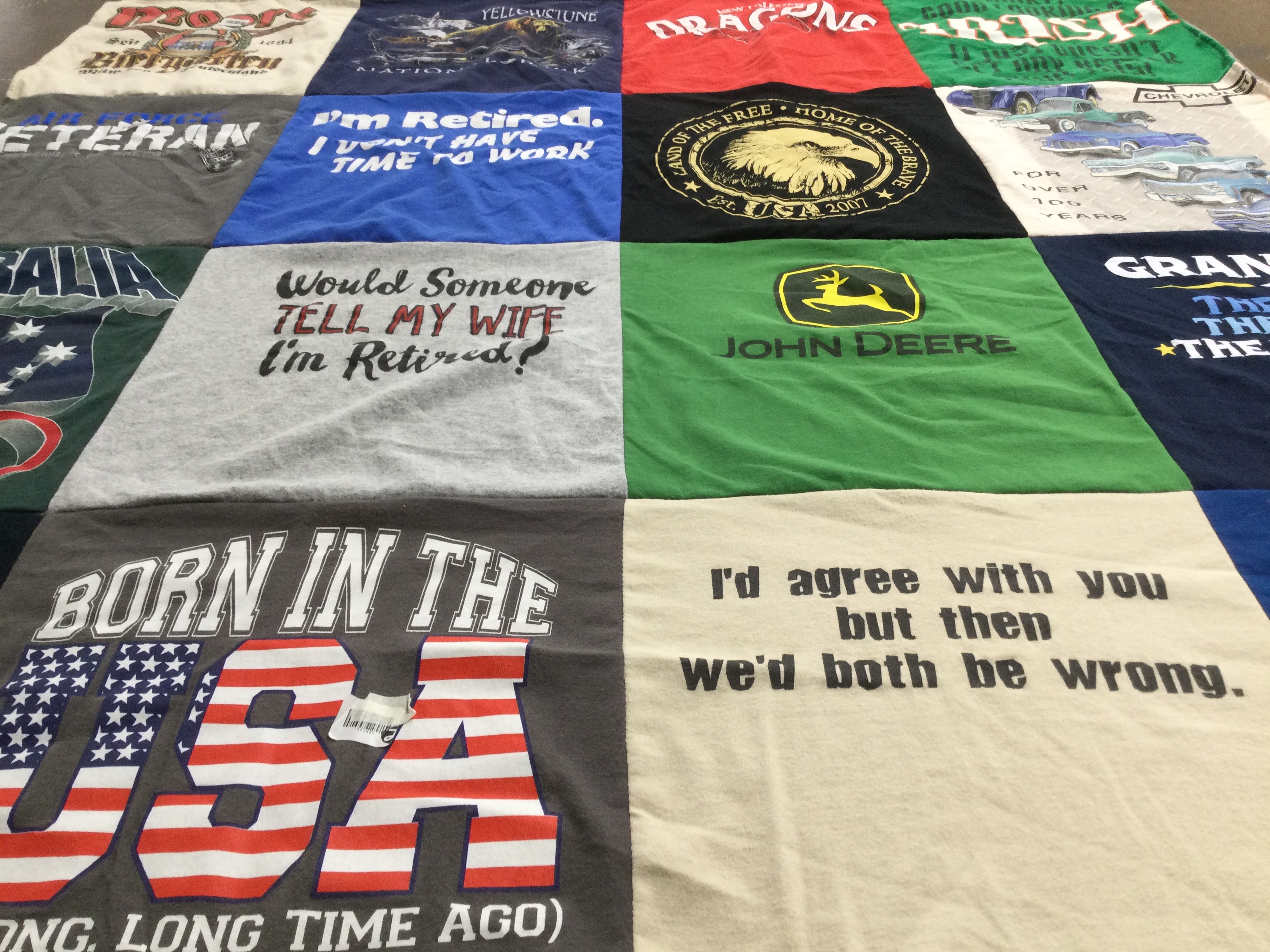 T-shirt quilt with veterans, retirement themes by Kim from IN
