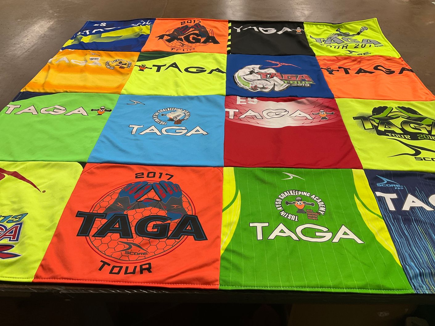 T-shirt quilt with soccer, goalkeeping themes by Laura from CA