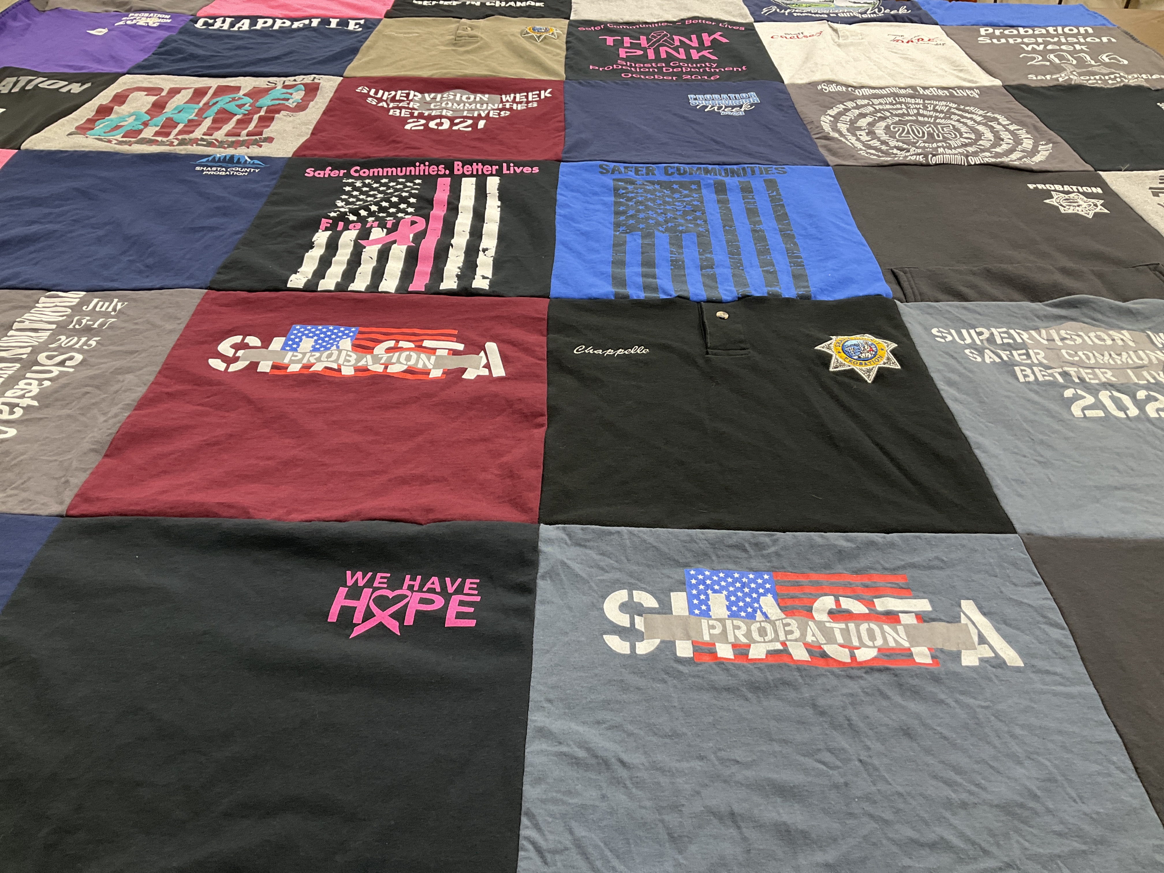 T-shirt quilt with community service, social issues themes by Chelsey from CA
