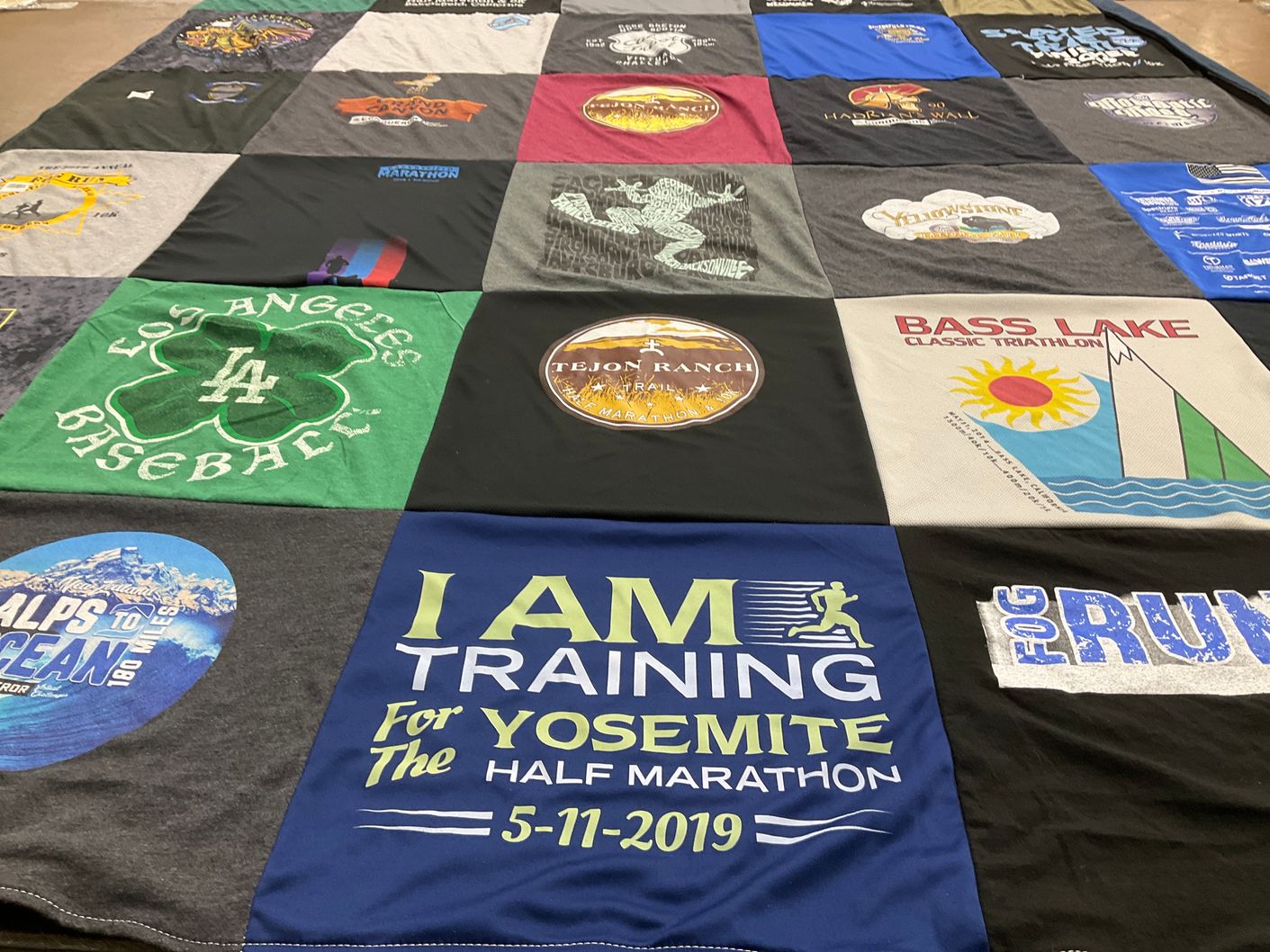 T-shirt quilt with marathons, triathlons themes by Vickie from CA