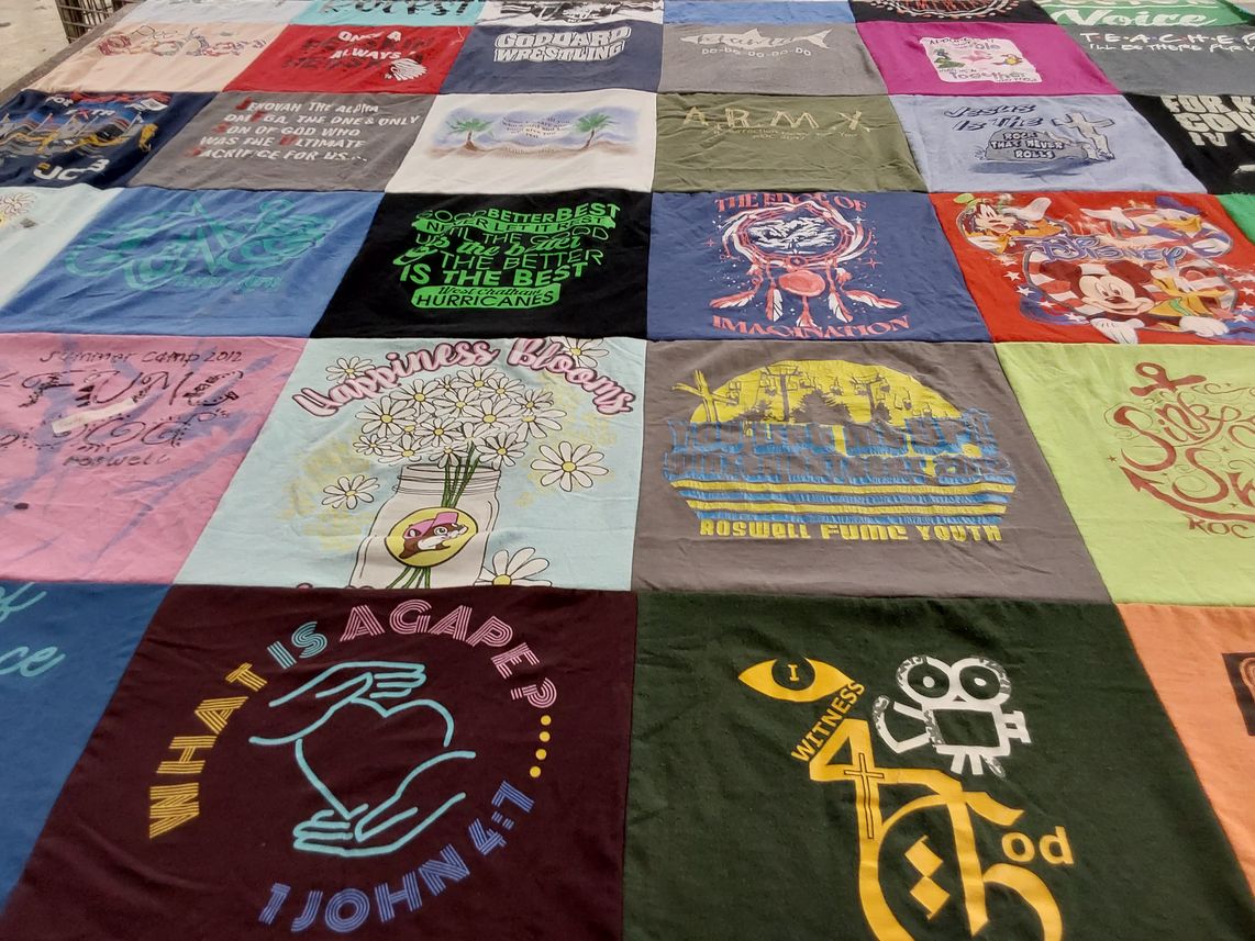 T-shirt quilt with camping, youth activities themes by John from GA