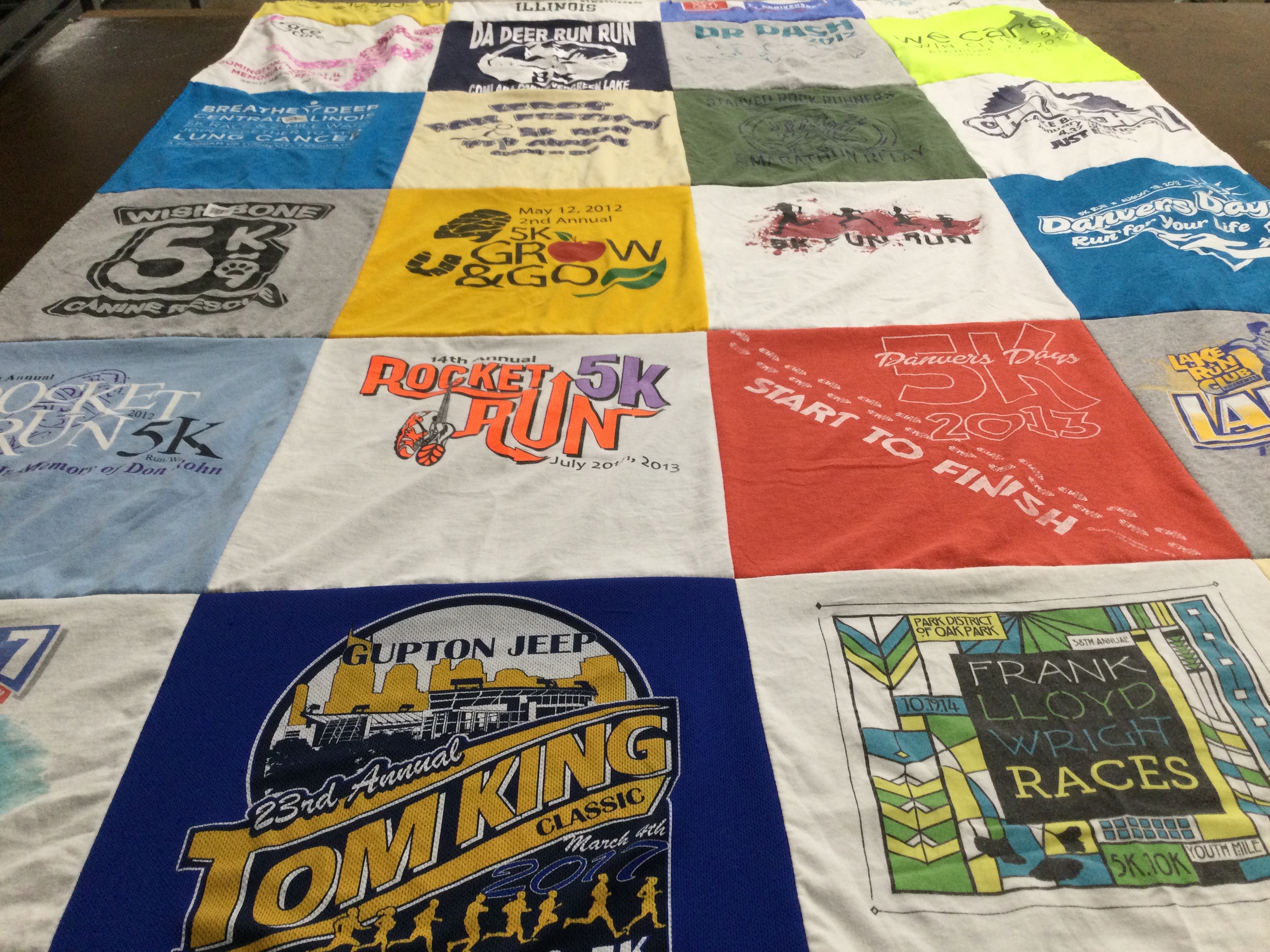 T-shirt quilt with running, sports themes by Carly from IL