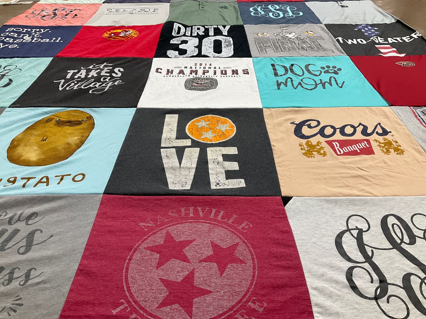 T-shirt quilt with dogs, baseball themes by Jessica from TN