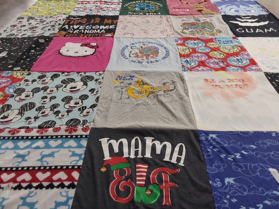 T-shirt quilt with cartoons, family themes by Salve from VA