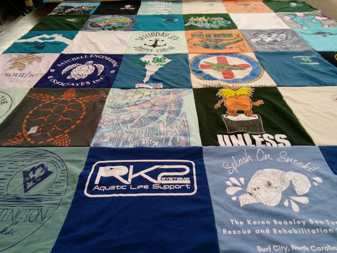 T-shirt quilt with marine, wildlife themes by Tina from NC