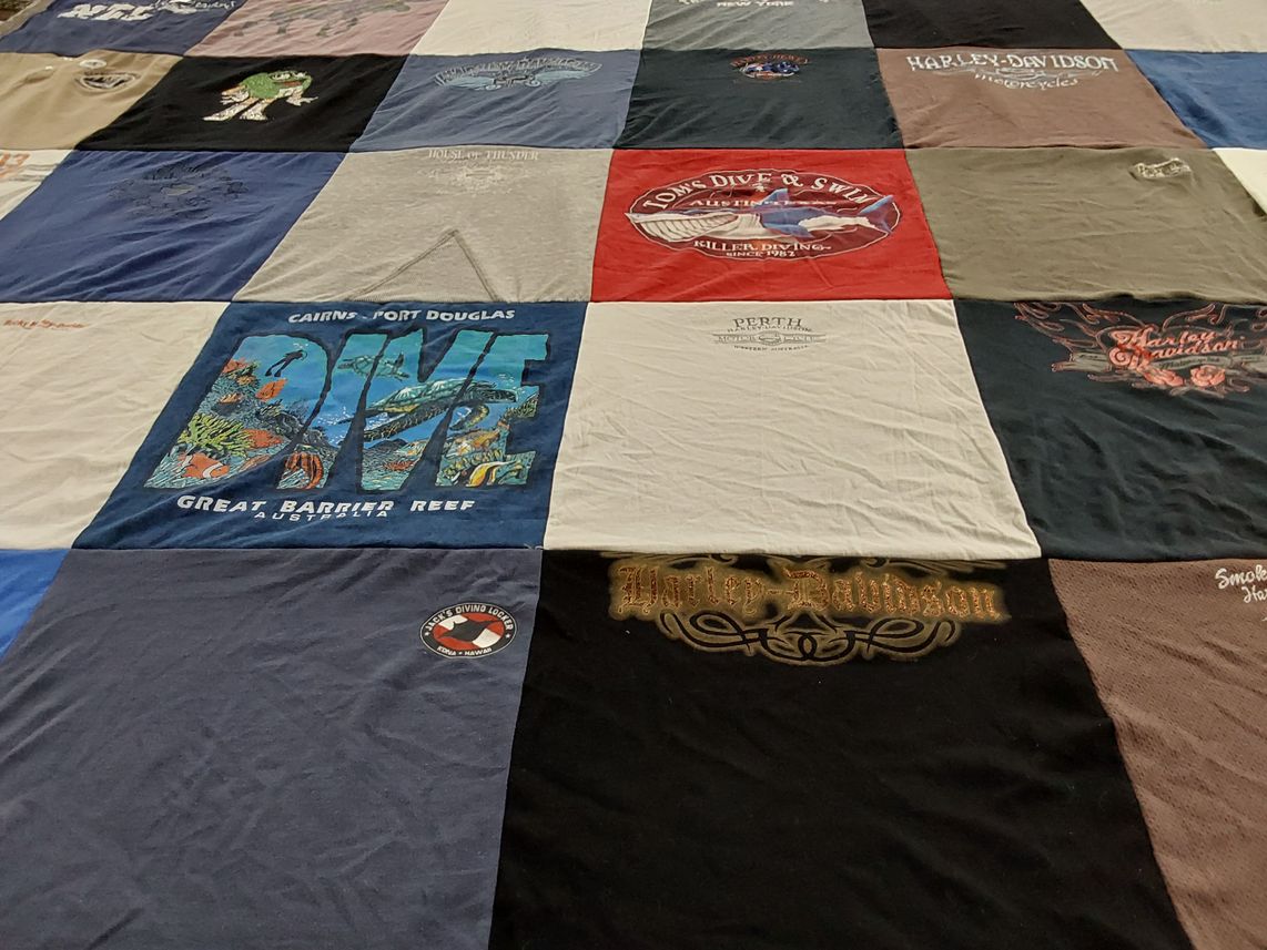 T-shirt quilt with diving, motorcycles themes by Kathy from AZ
