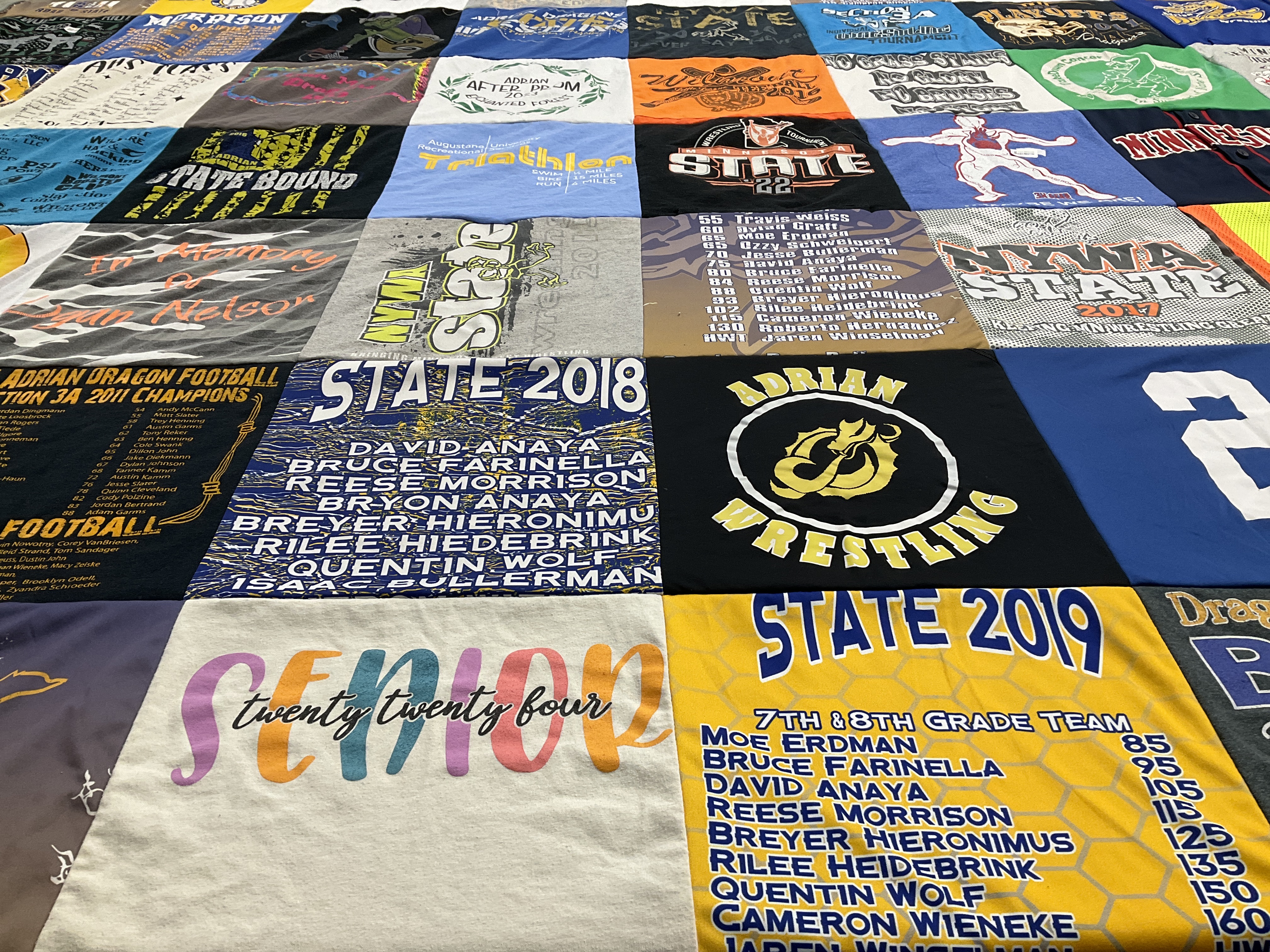 T-shirt quilt featuring adrian wrestling team, adrian dragon football team by Stacey from MN