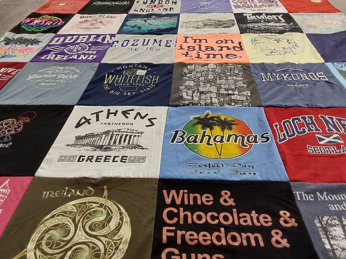 T-shirt quilt with travel, food themes by Theresa from NC