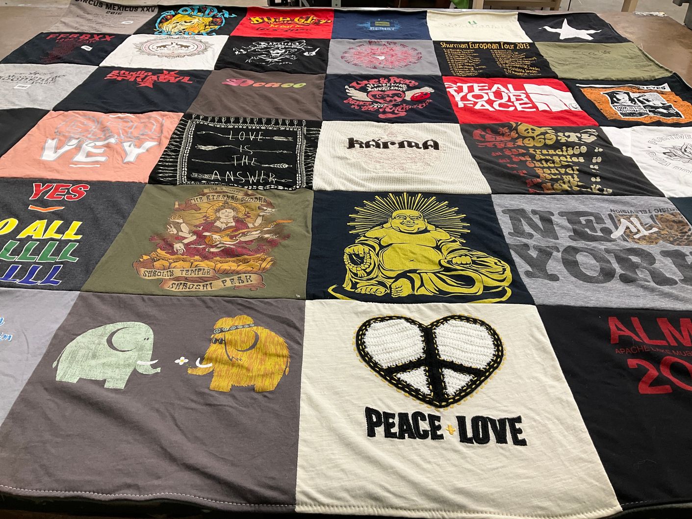 T-shirt quilt with music, spirituality themes by Christine from AZ