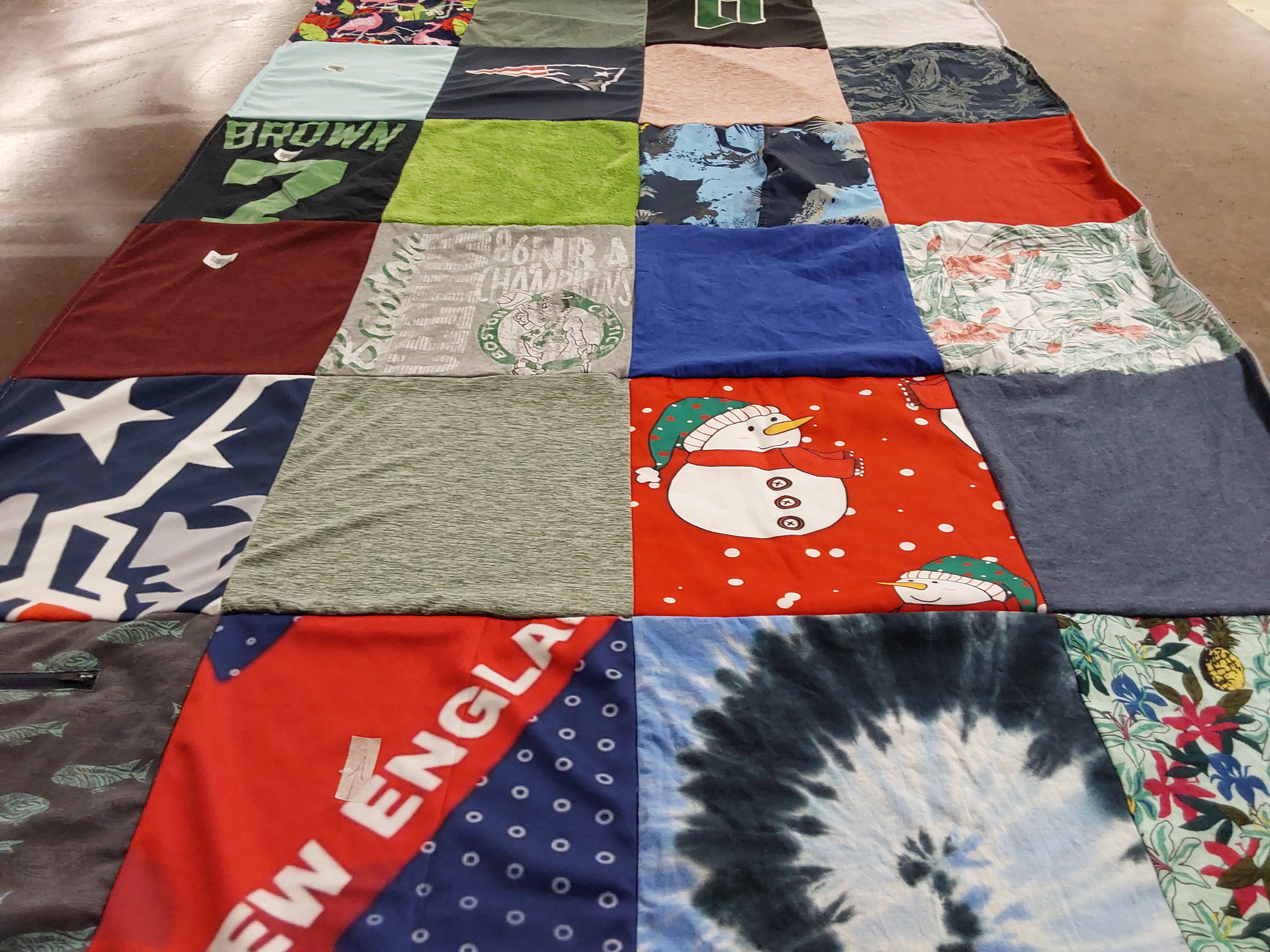 T-shirt quilt with sports, hobbies themes by Kristina from NH