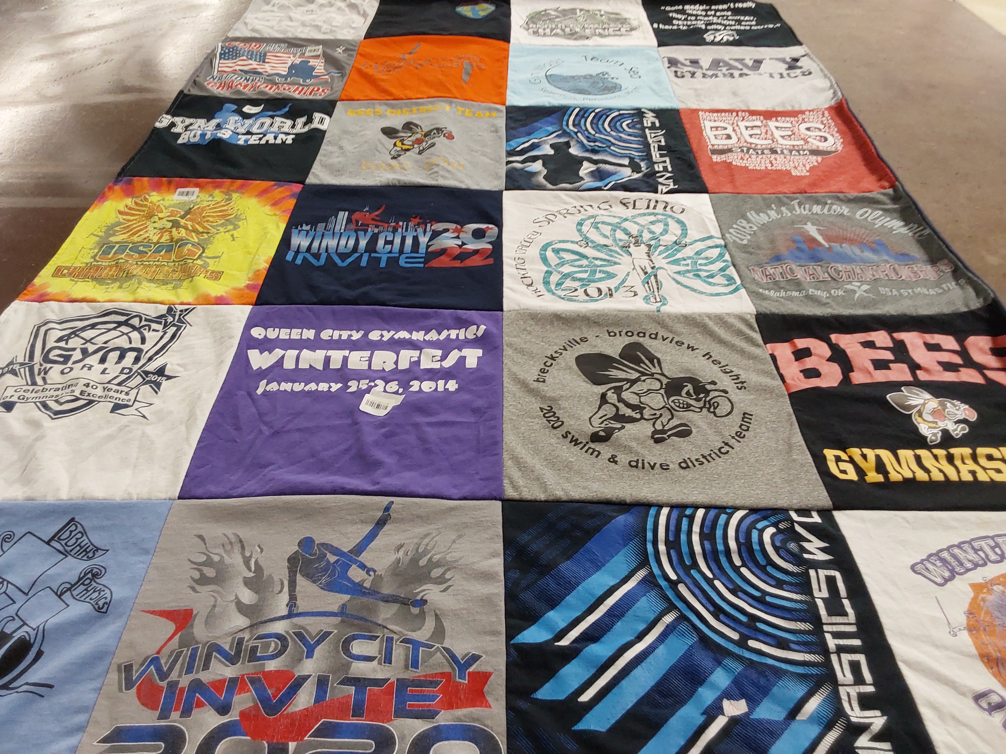 T-shirt quilt featuring bees gymnastic team by Kelly from OH