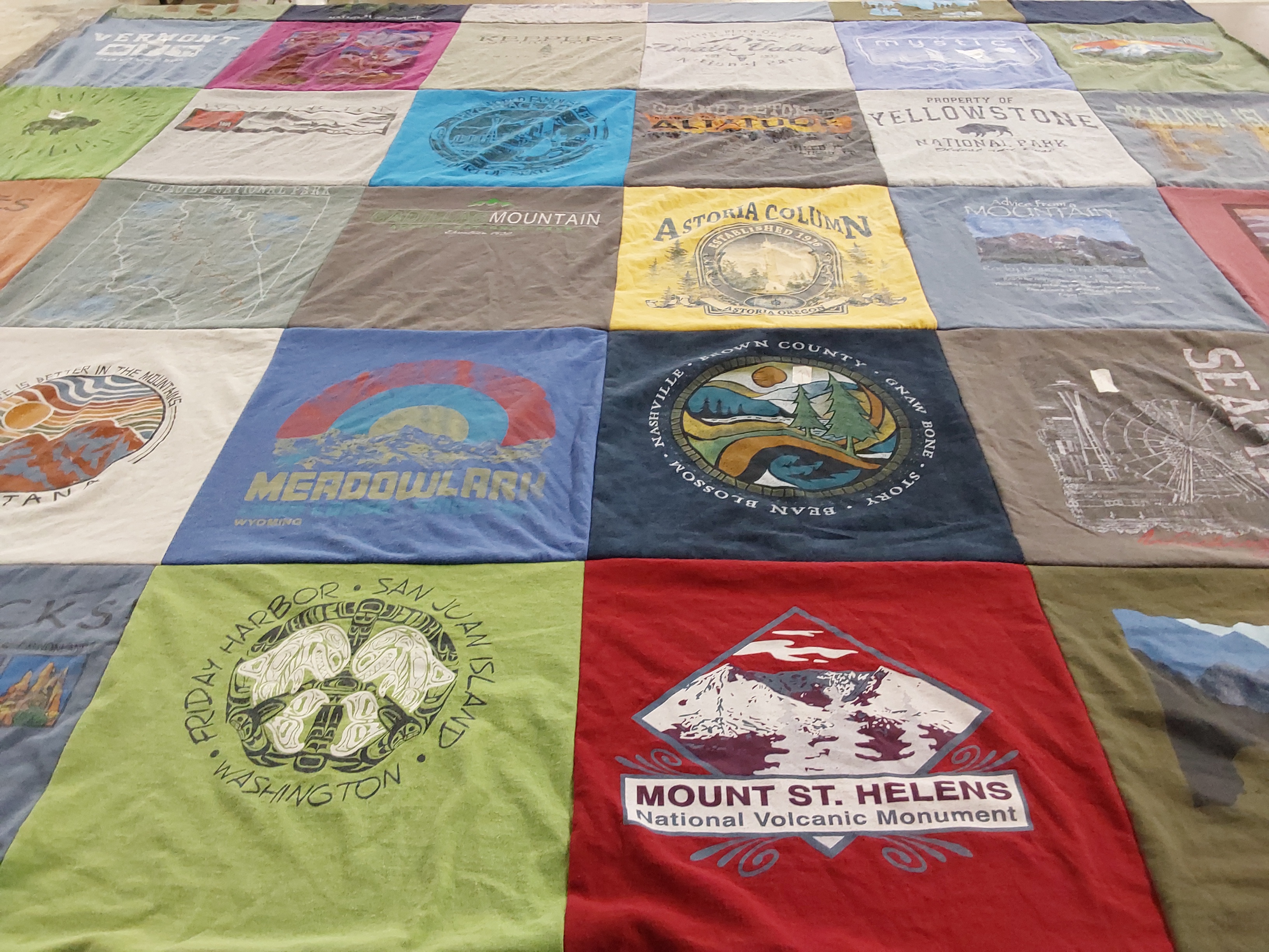 T-shirt quilt with national parks, volcanic landscapes themes by Alisa from OH