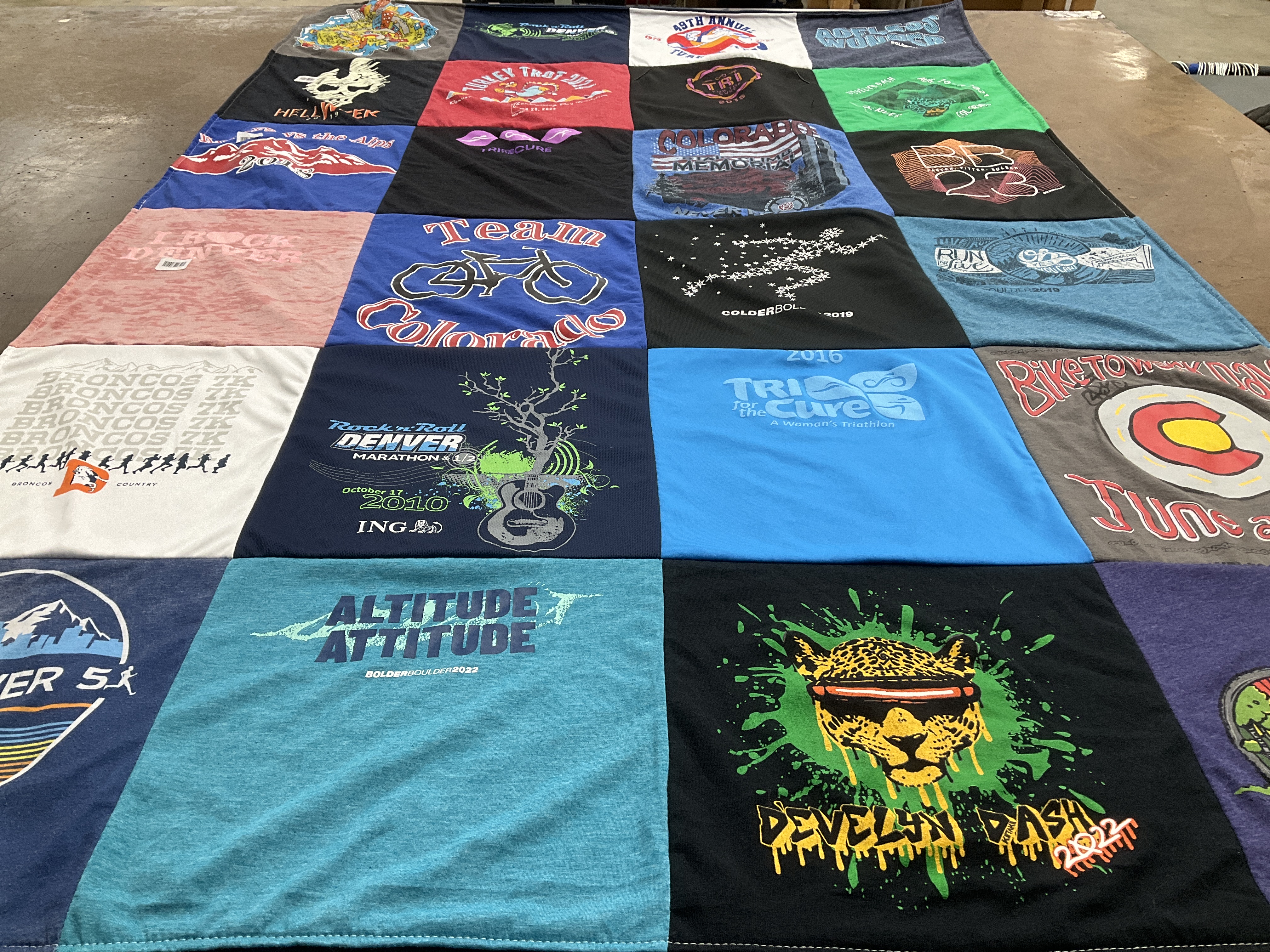T-shirt quilt with sports, running themes by Bob from CO
