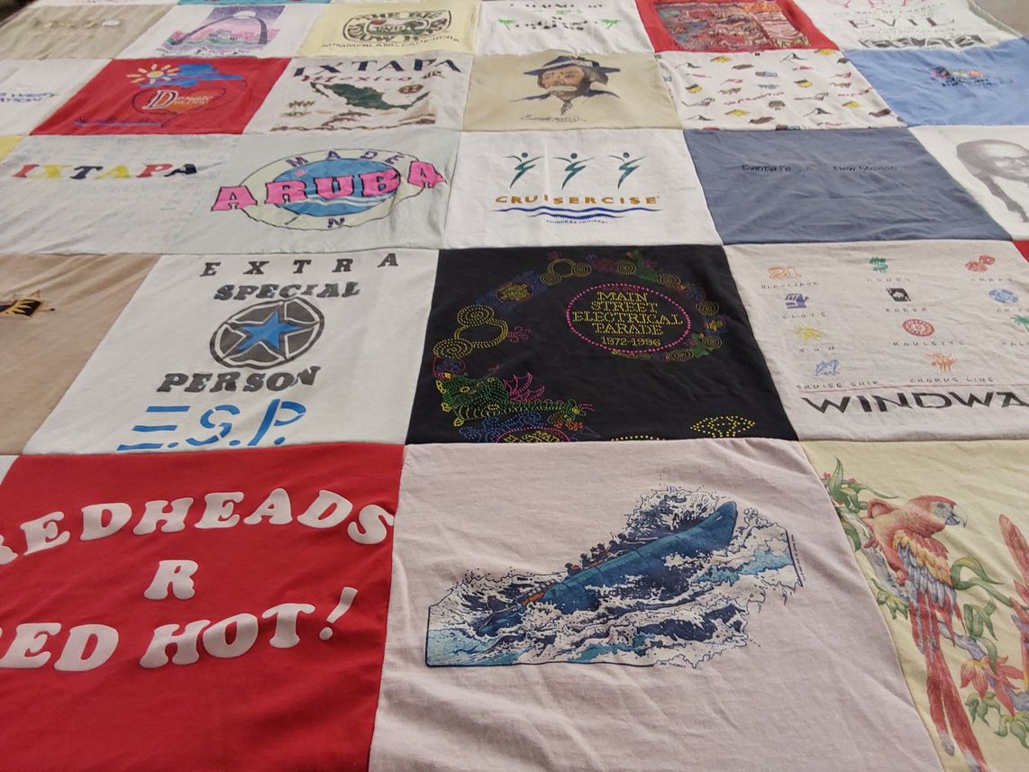T-shirt quilt with travel, vacation themes by Danielle from CA