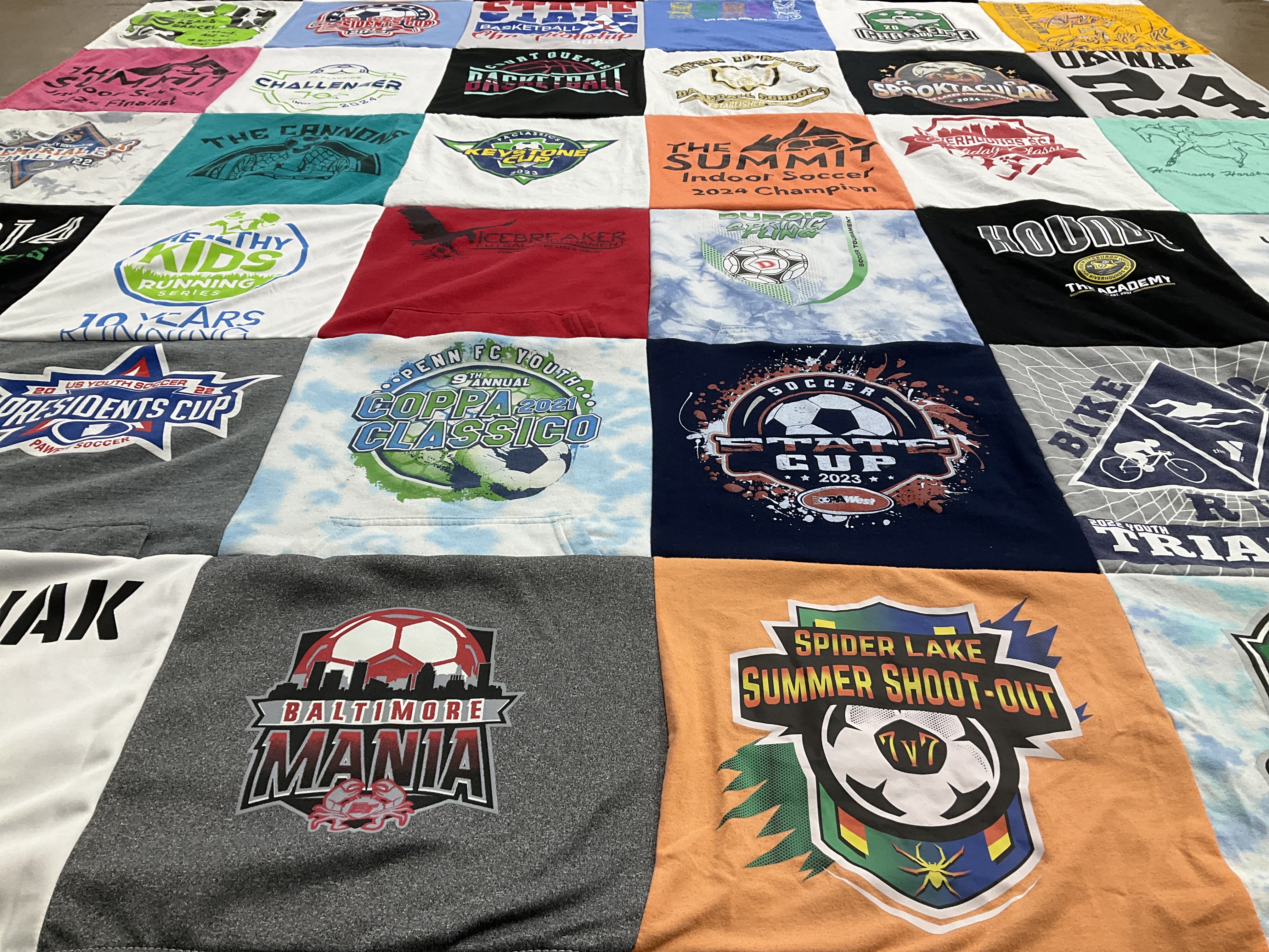 T-shirt quilt with soccer, outdoor sports themes by Andrea from PA