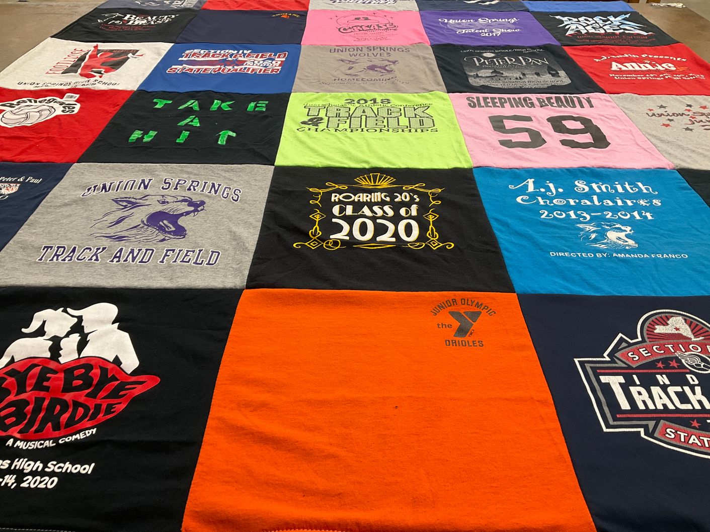T-shirt quilt featuring union springs track and field by Lori from NY