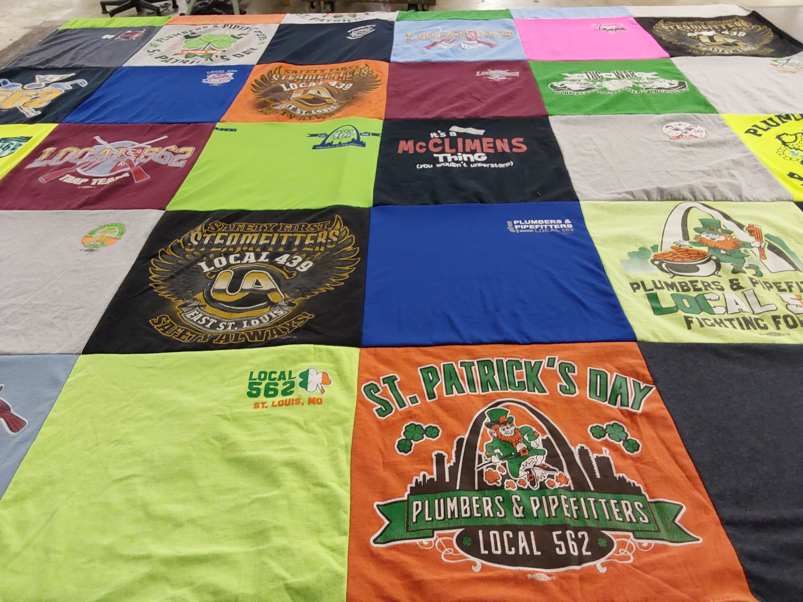 T-shirt quilt with plumbing, pipefitting themes by Karen from MO