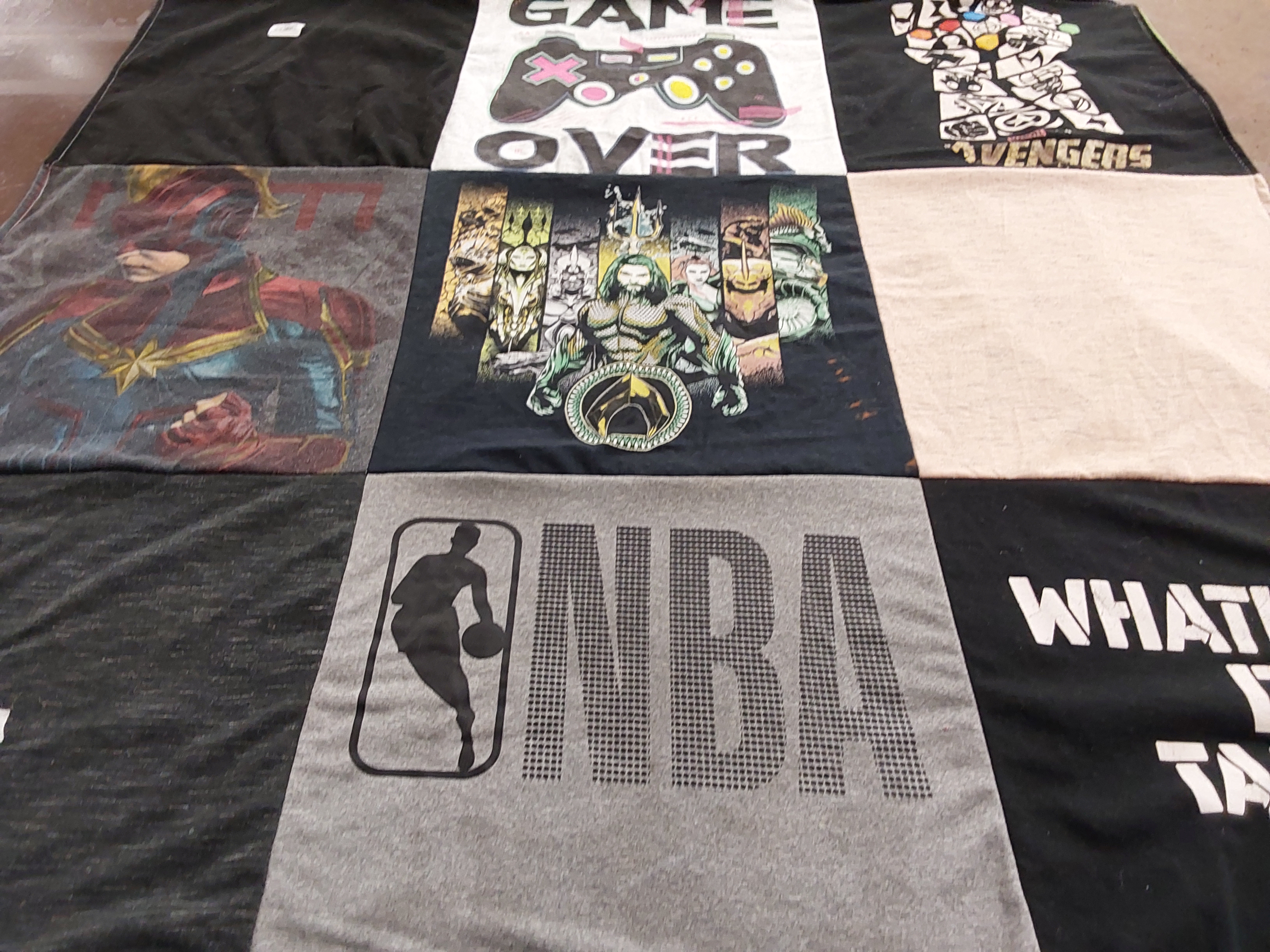 T-shirt quilt with video games, superheroes themes by Marcy Ann from TX