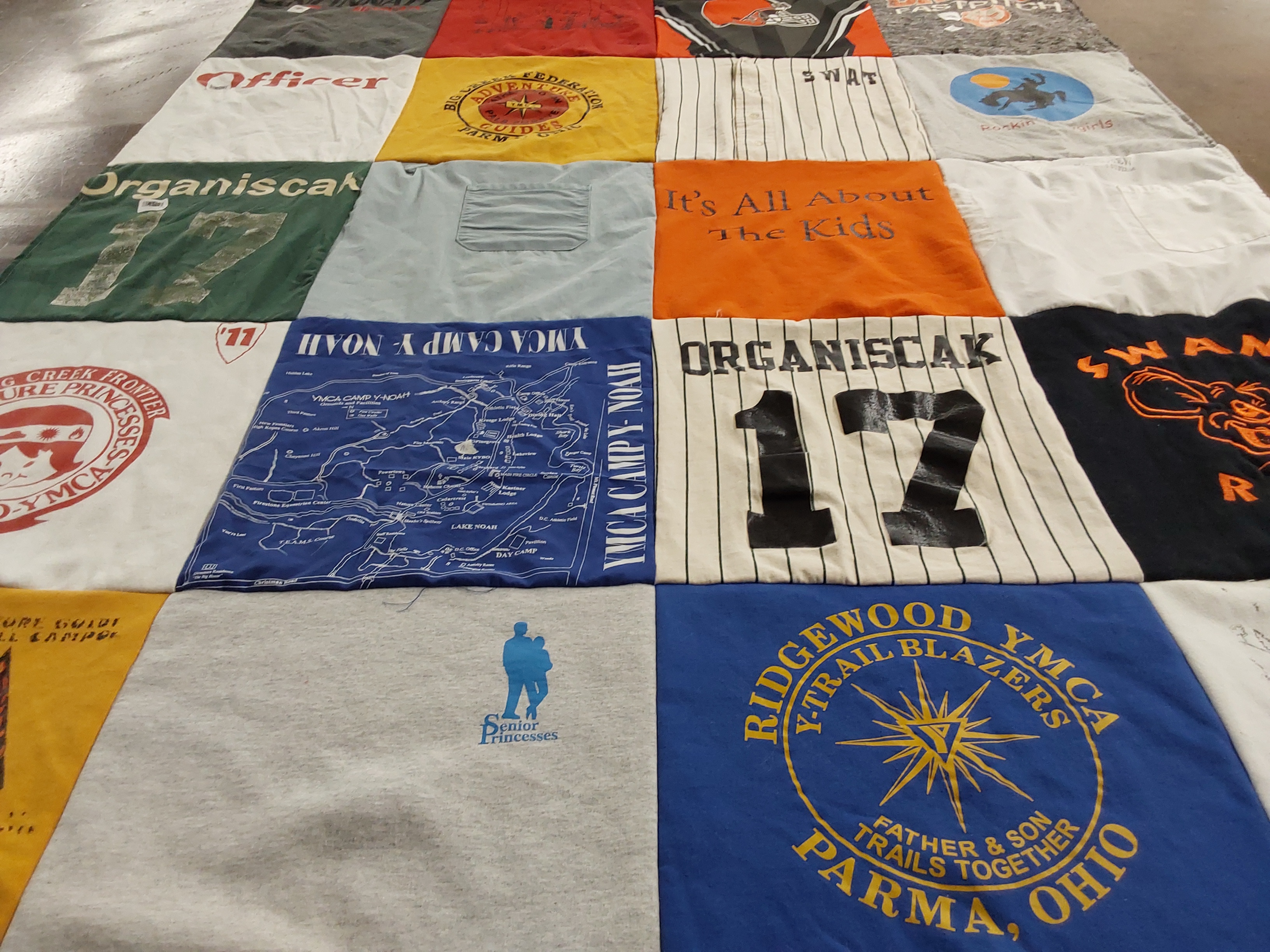 T-shirt quilt with camping, youth activities themes by Elsa from OH