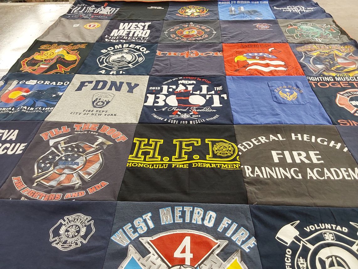 T-shirt quilt with firefighting, emergency services themes by Jennifer from CO